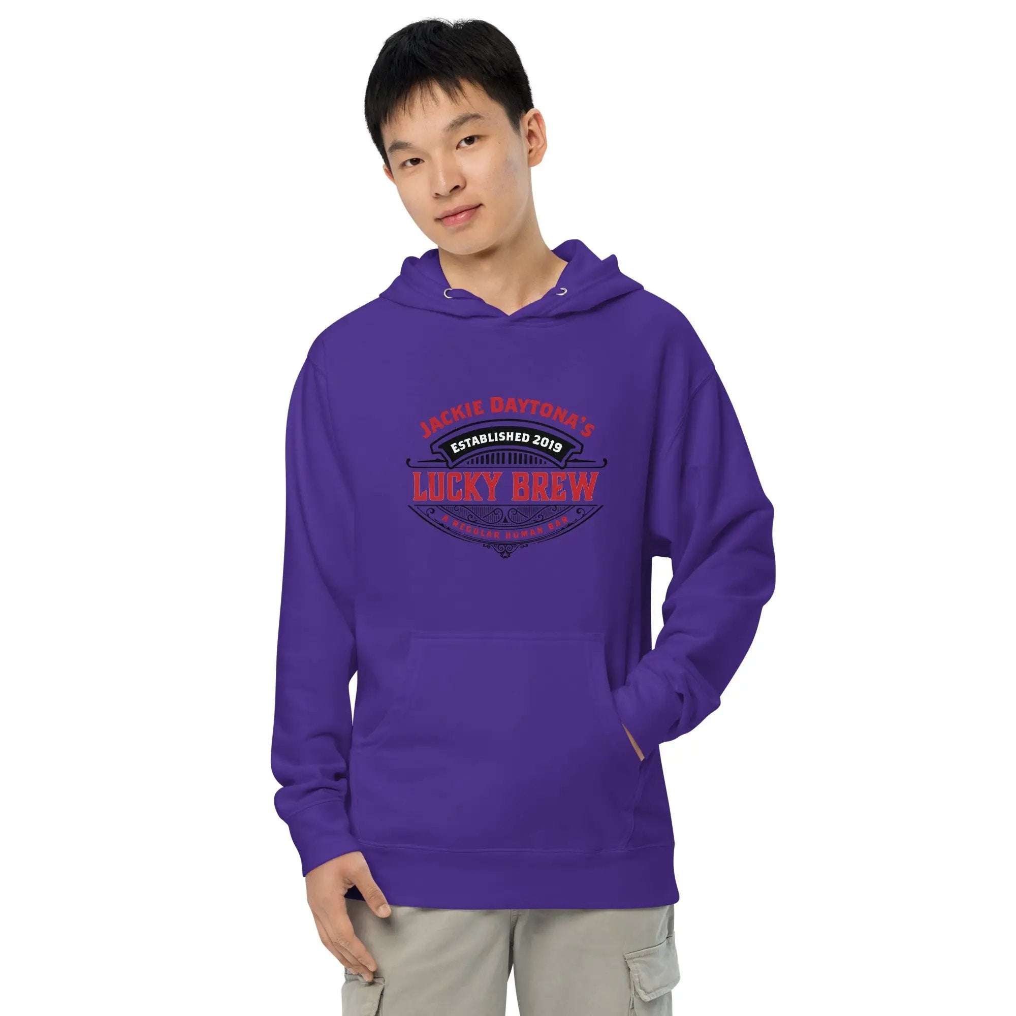 a man wearing a purple hoodie with the words lucky show on it