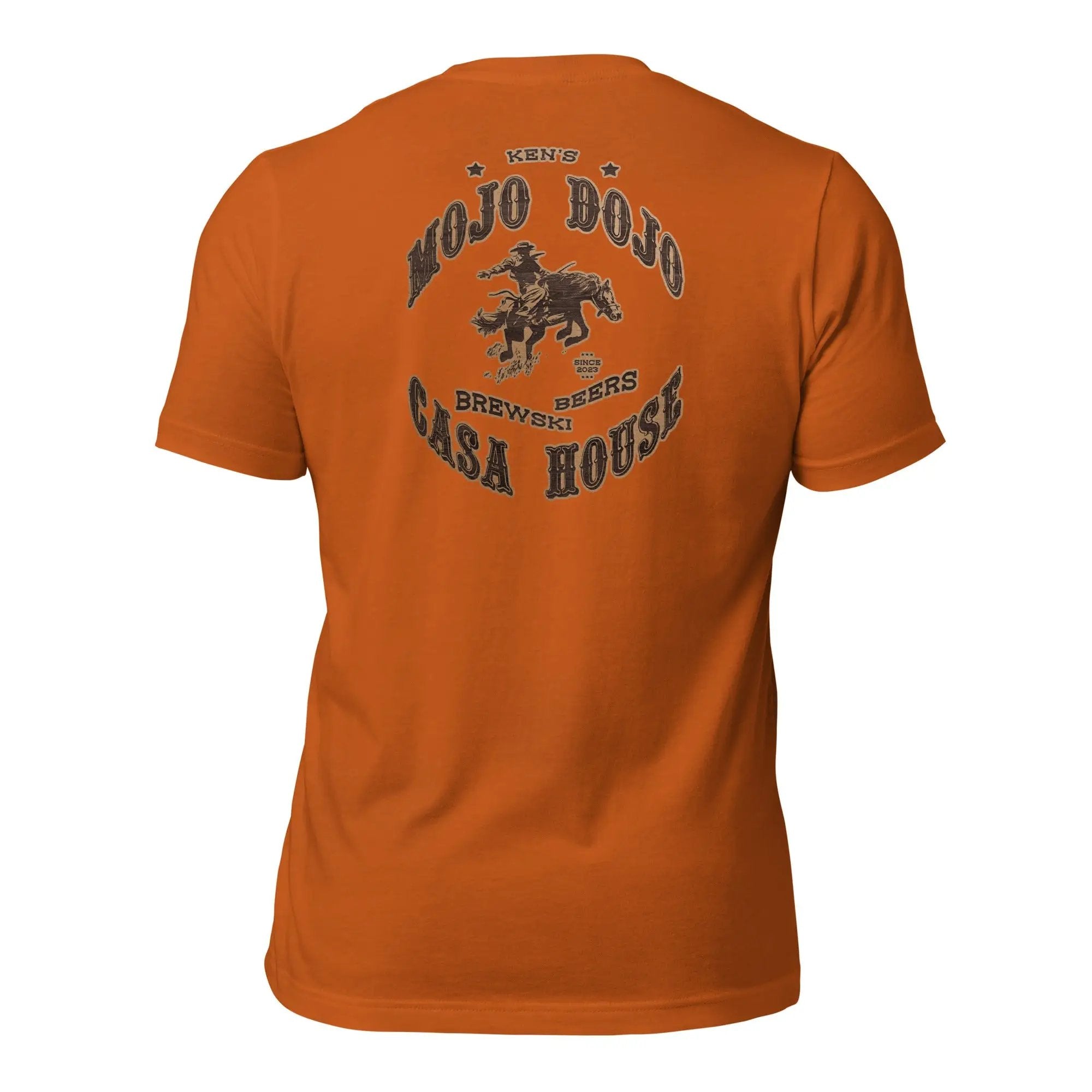a women's orange t - shirt with an image of a cowboy riding a