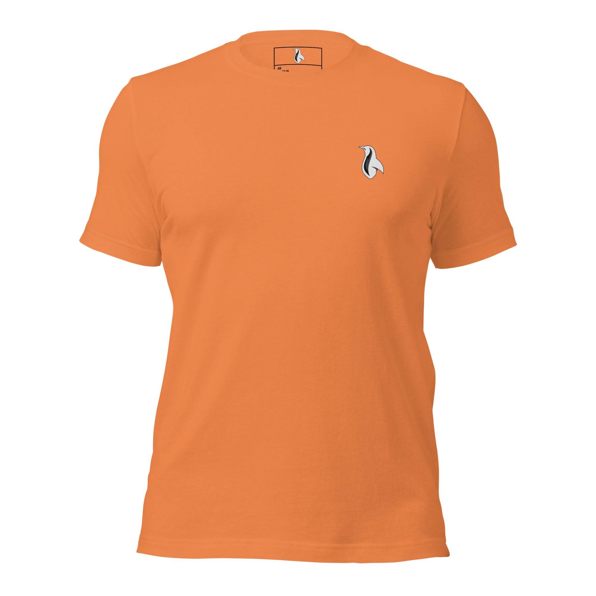 an orange t - shirt with a penguin on it