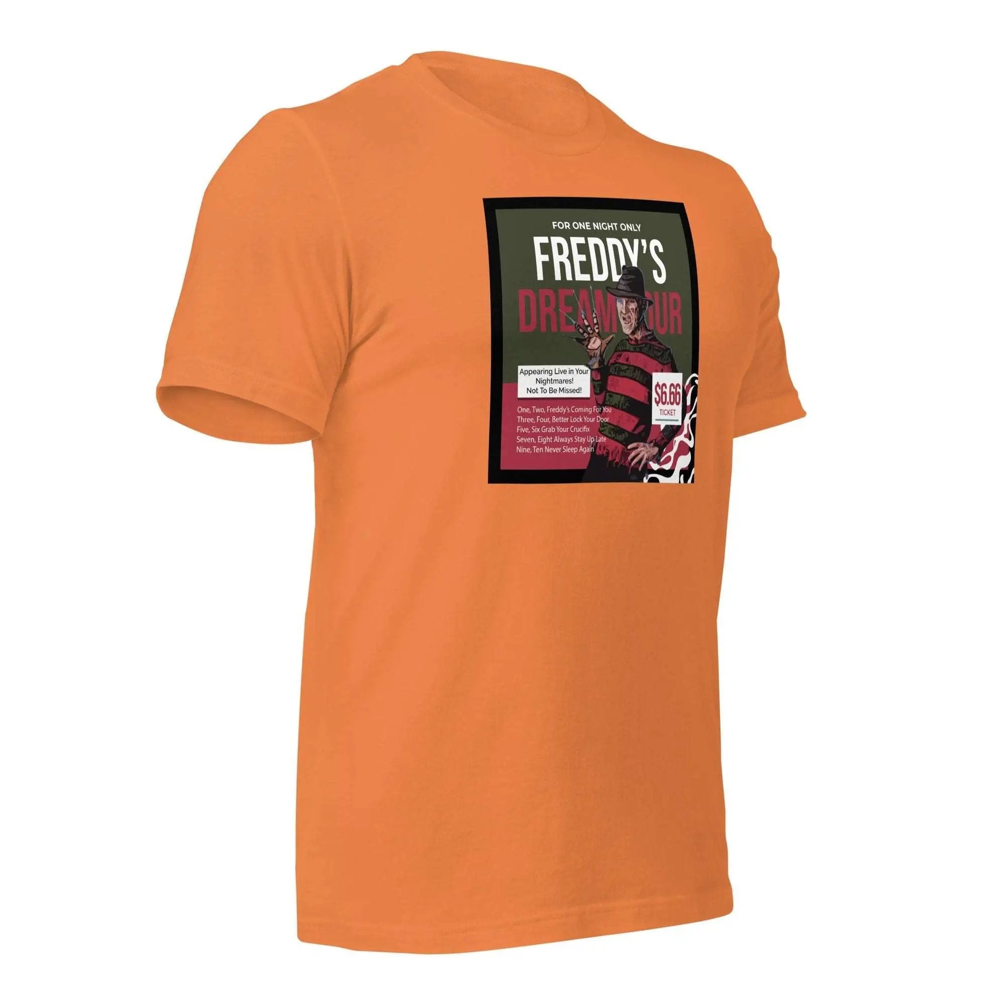 an orange t - shirt with a picture of a person's head on it