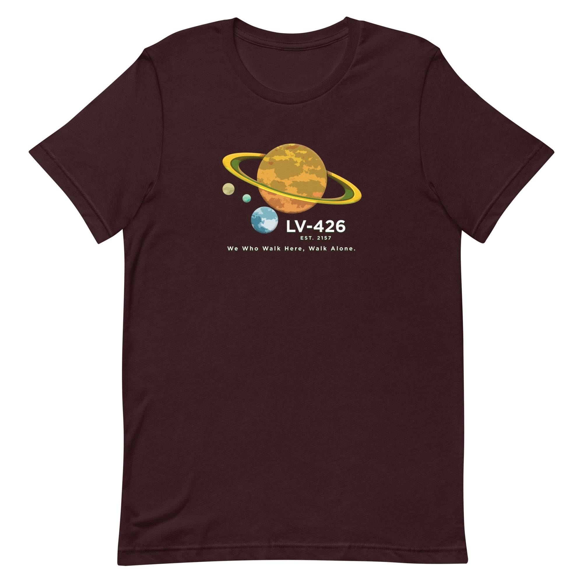 a maroon t - shirt with the nasa logo on it
