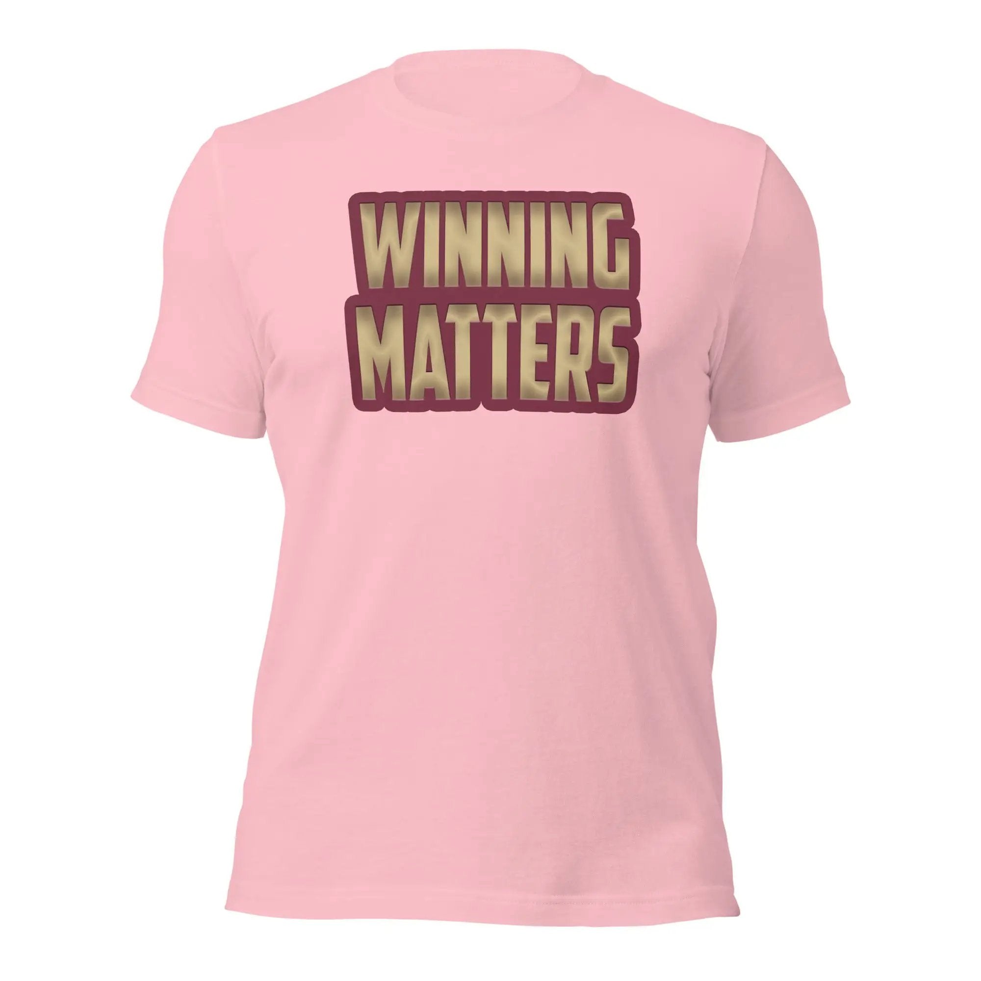 a pink t - shirt with the words winning matters printed on it