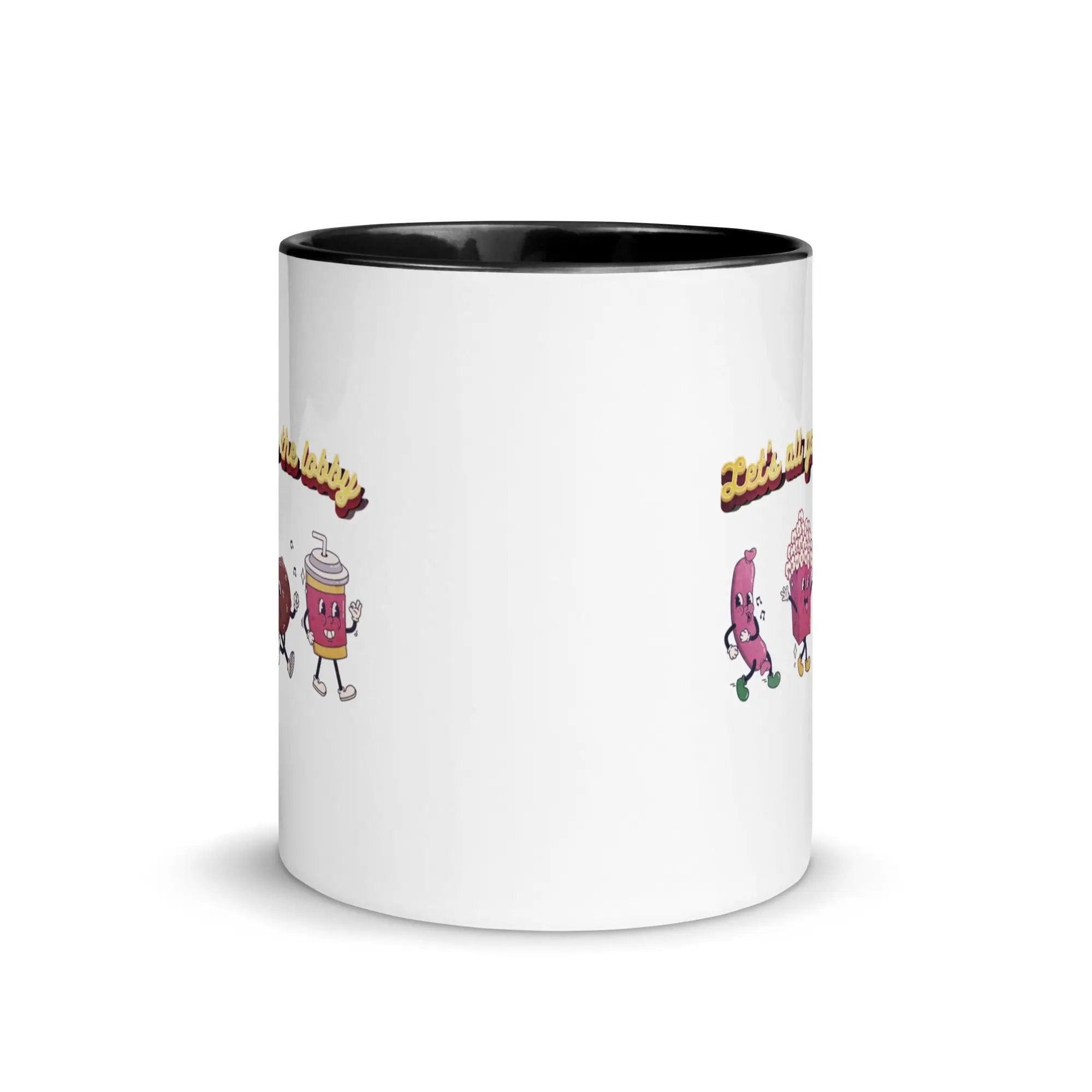 a white and black coffee mug with cartoon characters on it