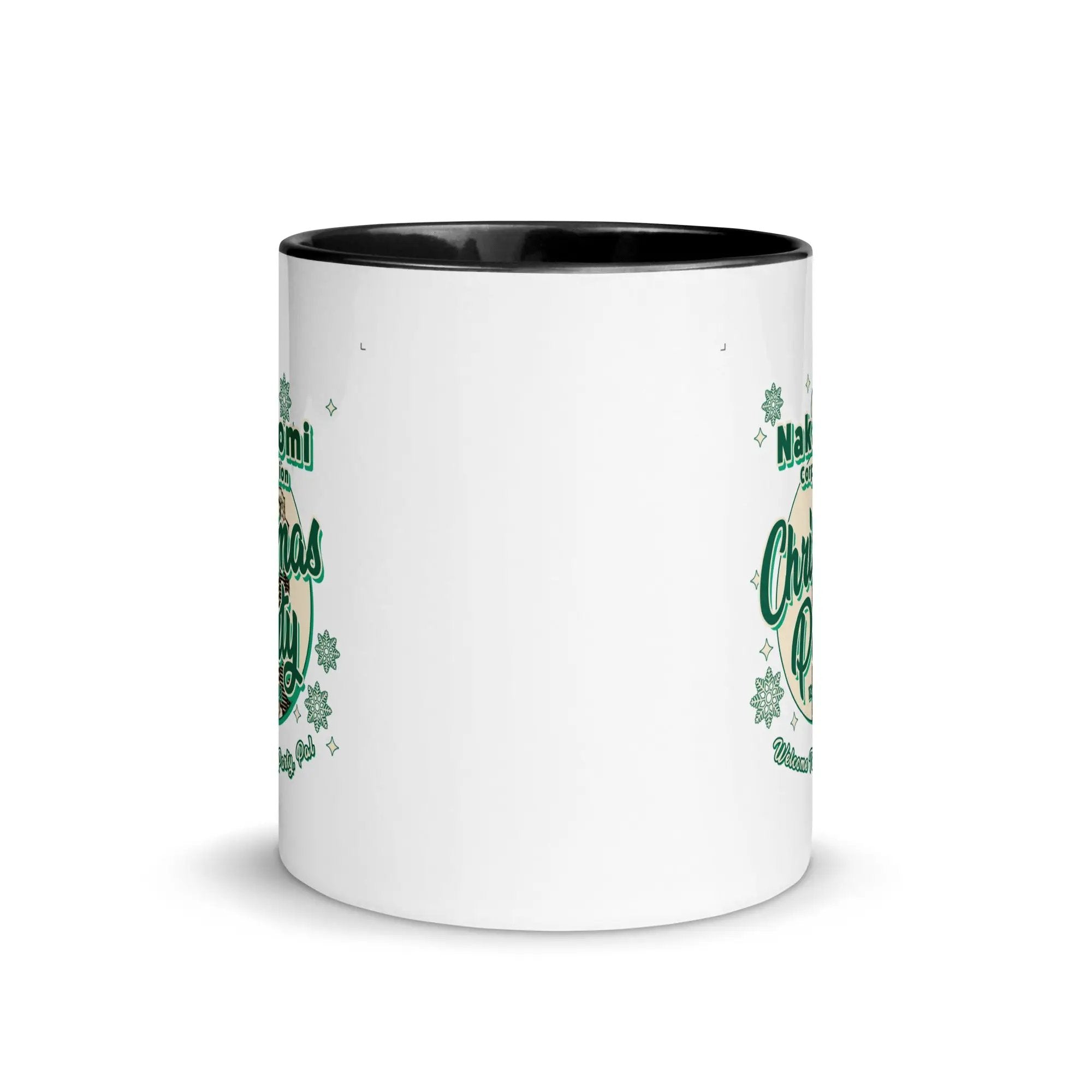 a white and black coffee mug with shamrocks on it