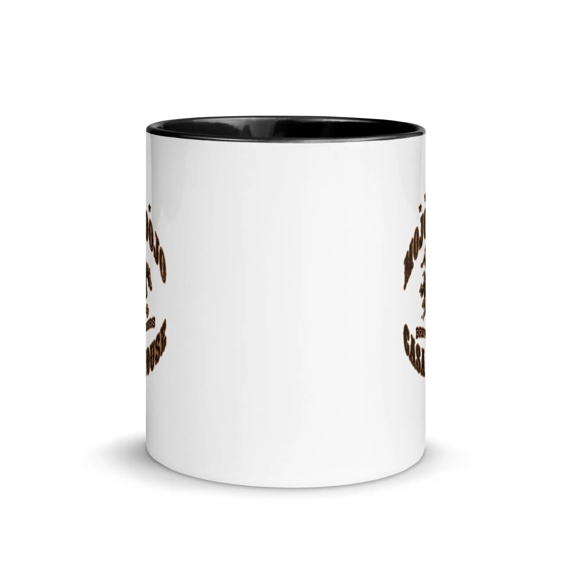 a white coffee mug with a brown and white design