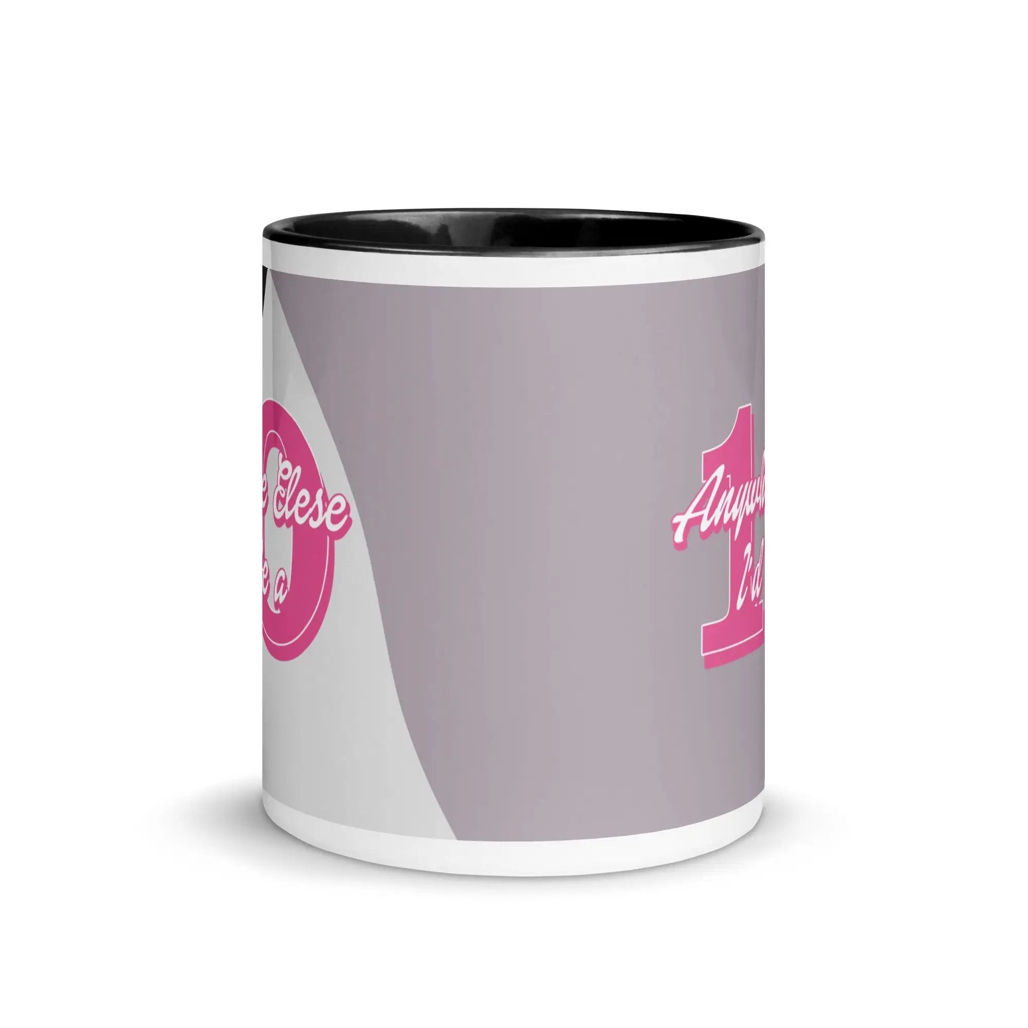a pink and white coffee mug with the letter i on it