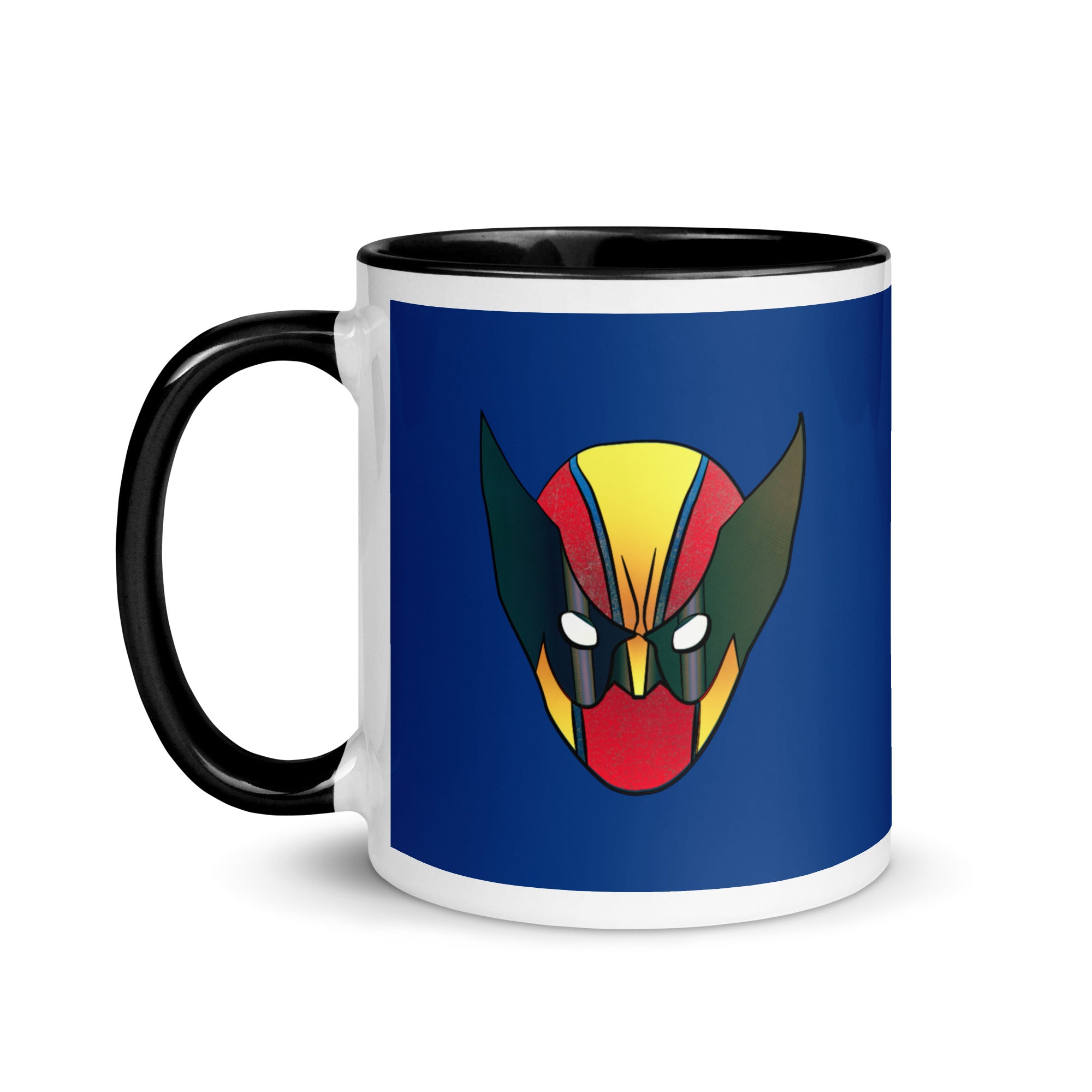 a black and white coffee mug with a red, yellow, and green devil face
