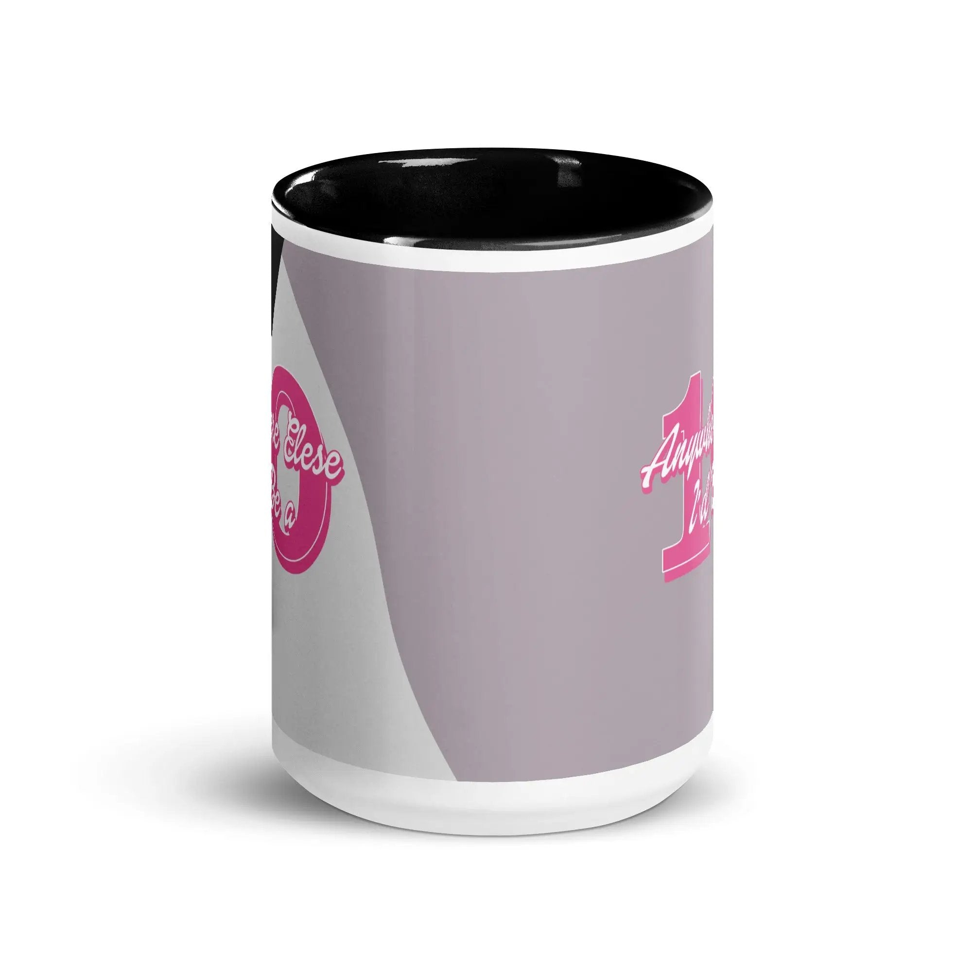 a black and white coffee mug with pink lettering