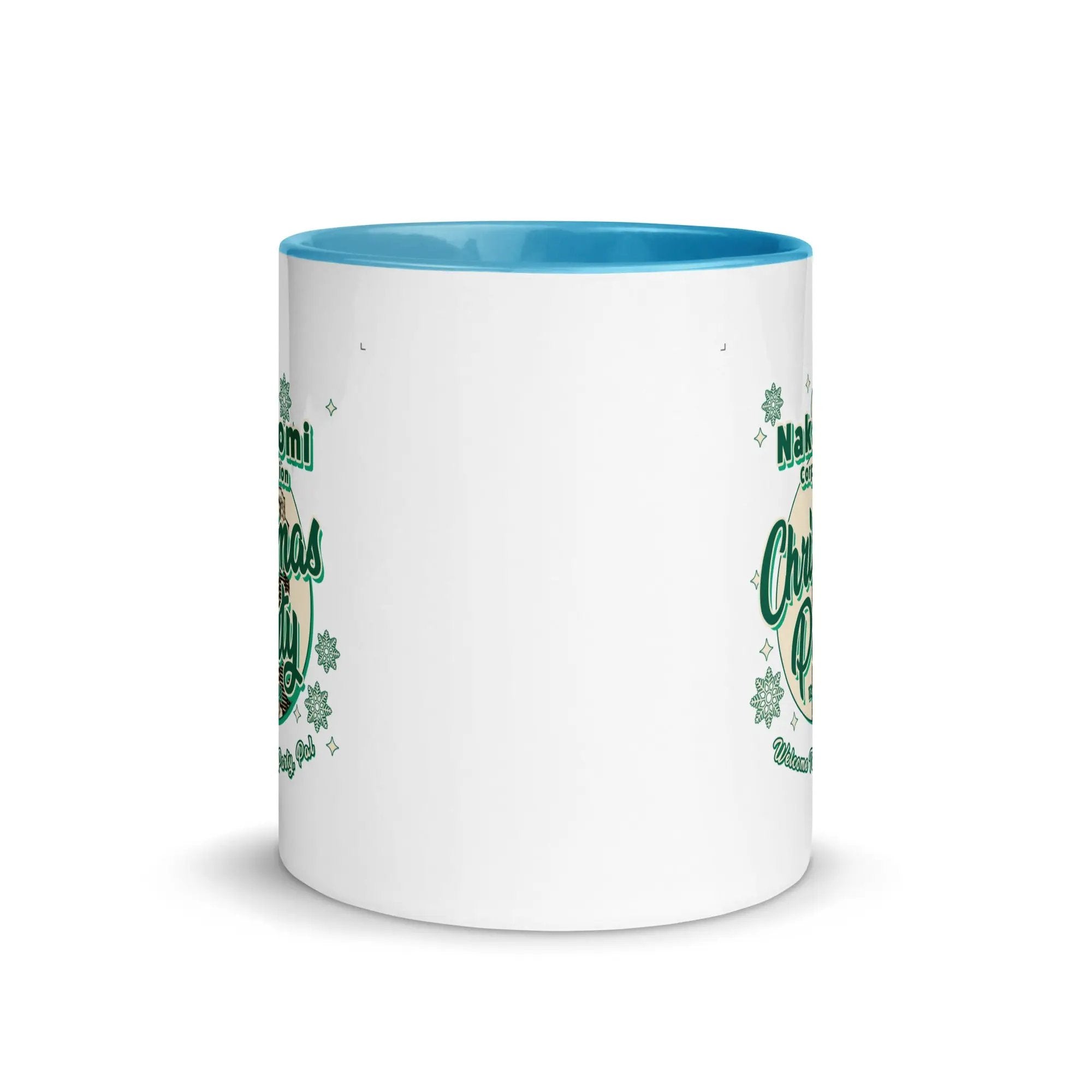 a white and blue coffee mug with shamrocks on it