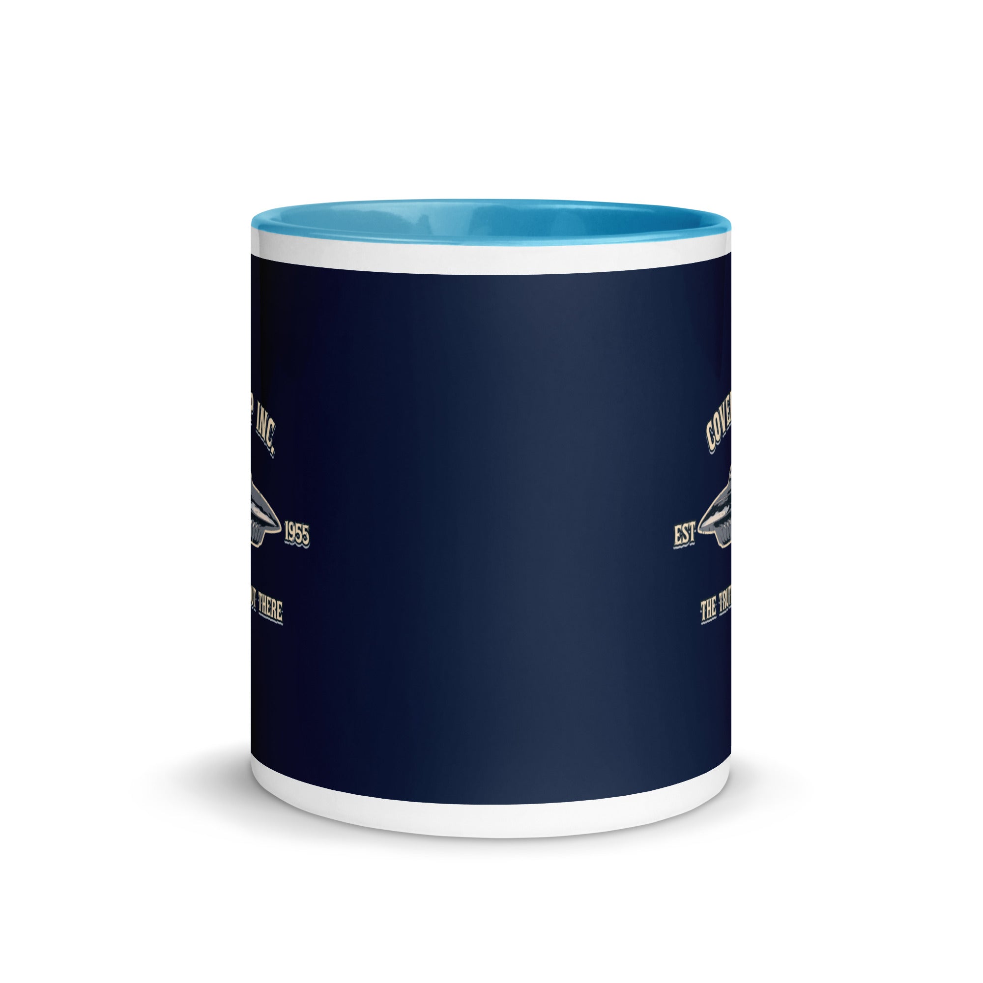 a blue and white coffee mug with a blue bottom