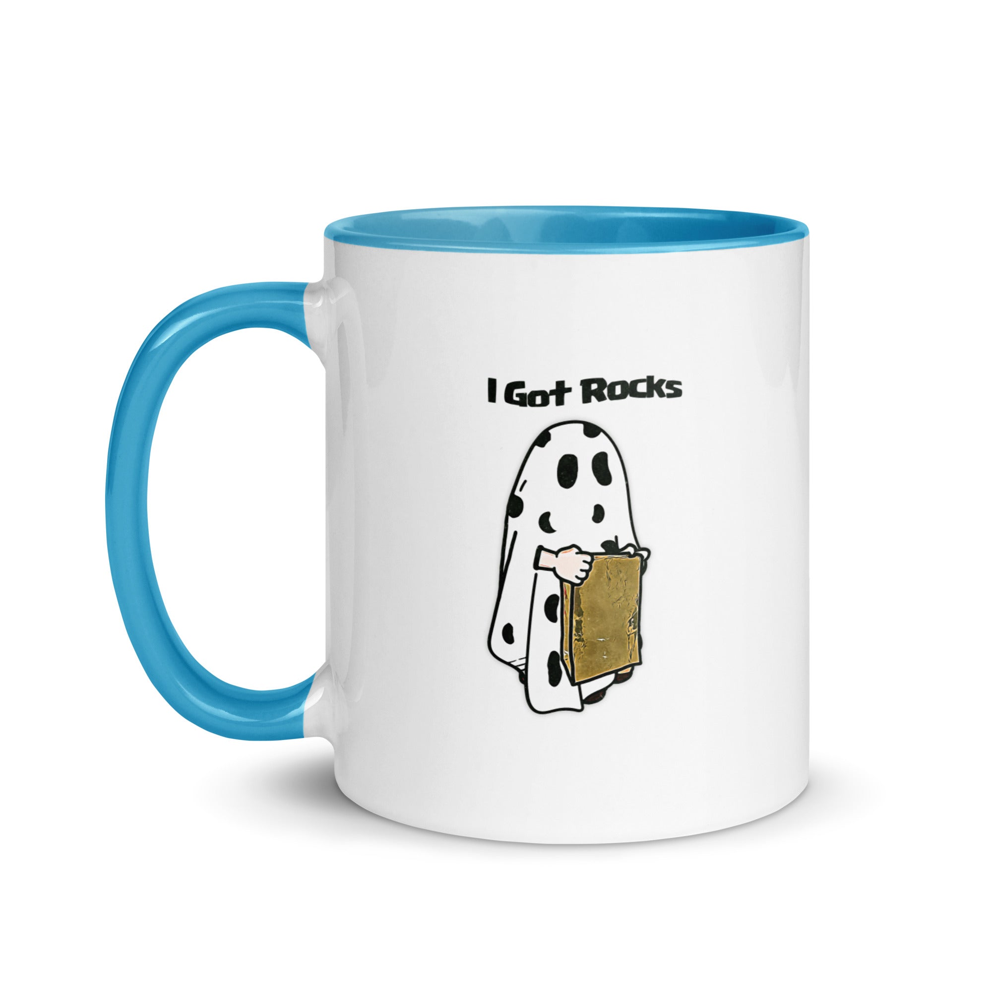 a blue and white coffee mug with a cartoon of a ghost holding a piece of