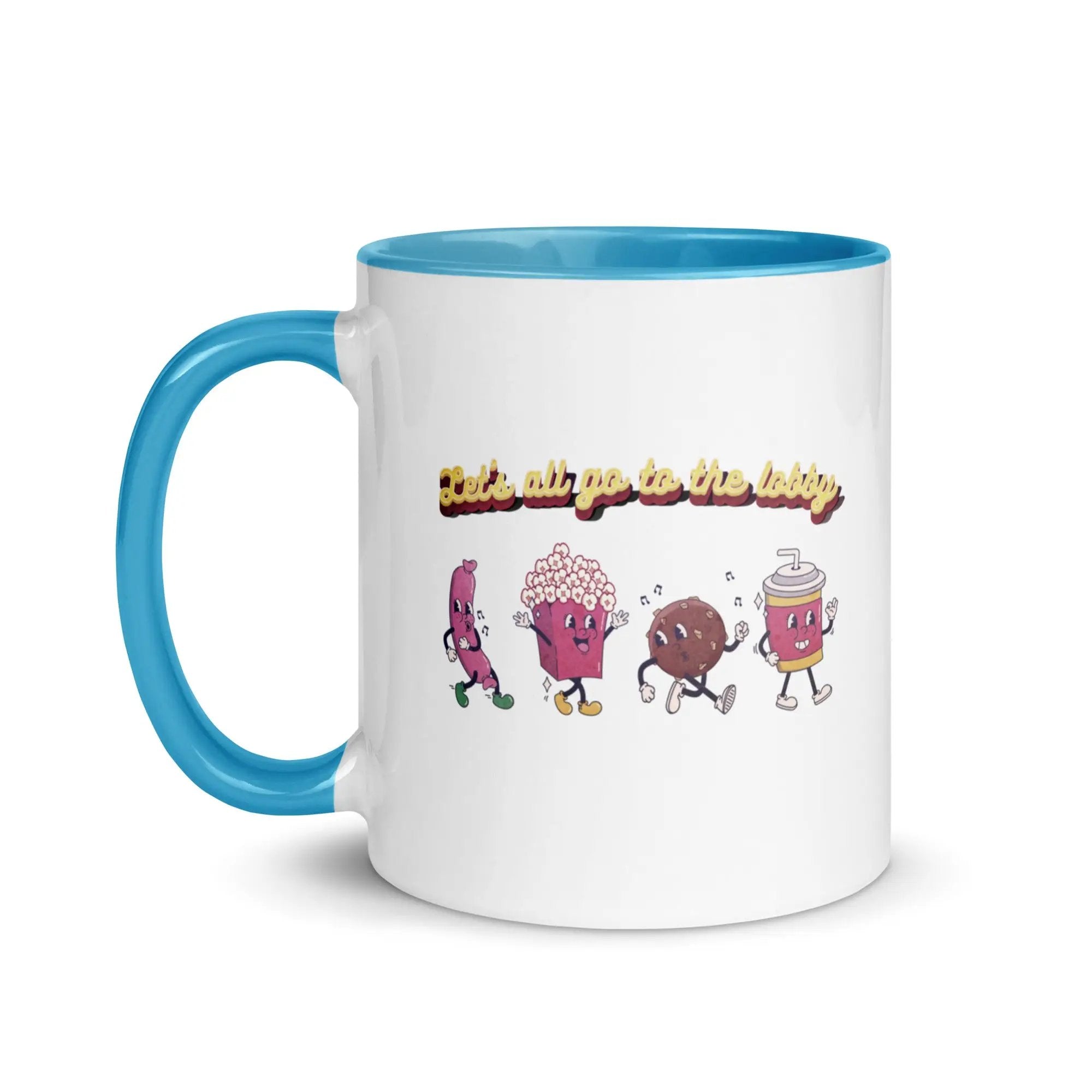 a blue and white coffee mug with cartoon characters on it