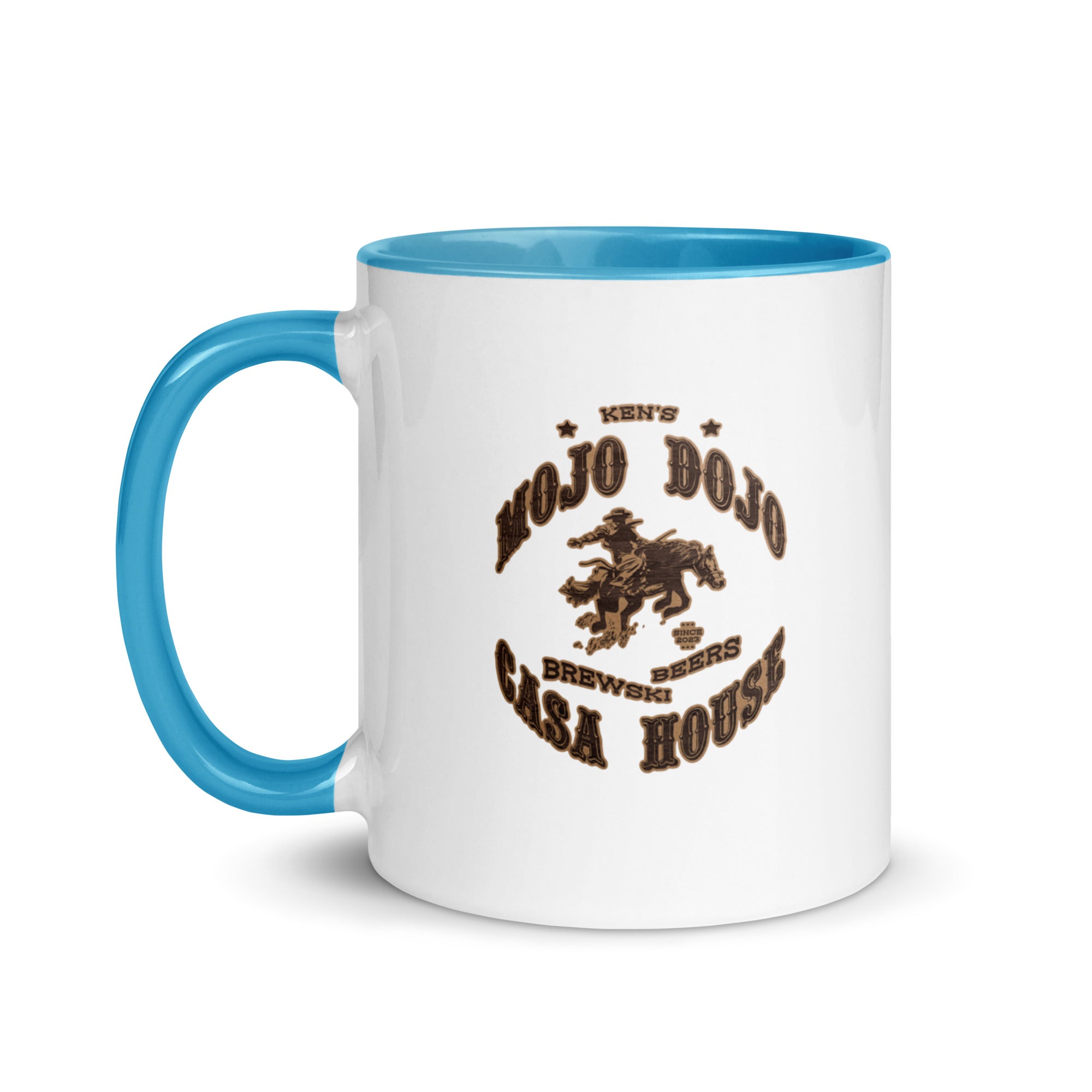 a blue and white coffee mug with the words old dog saloon on it