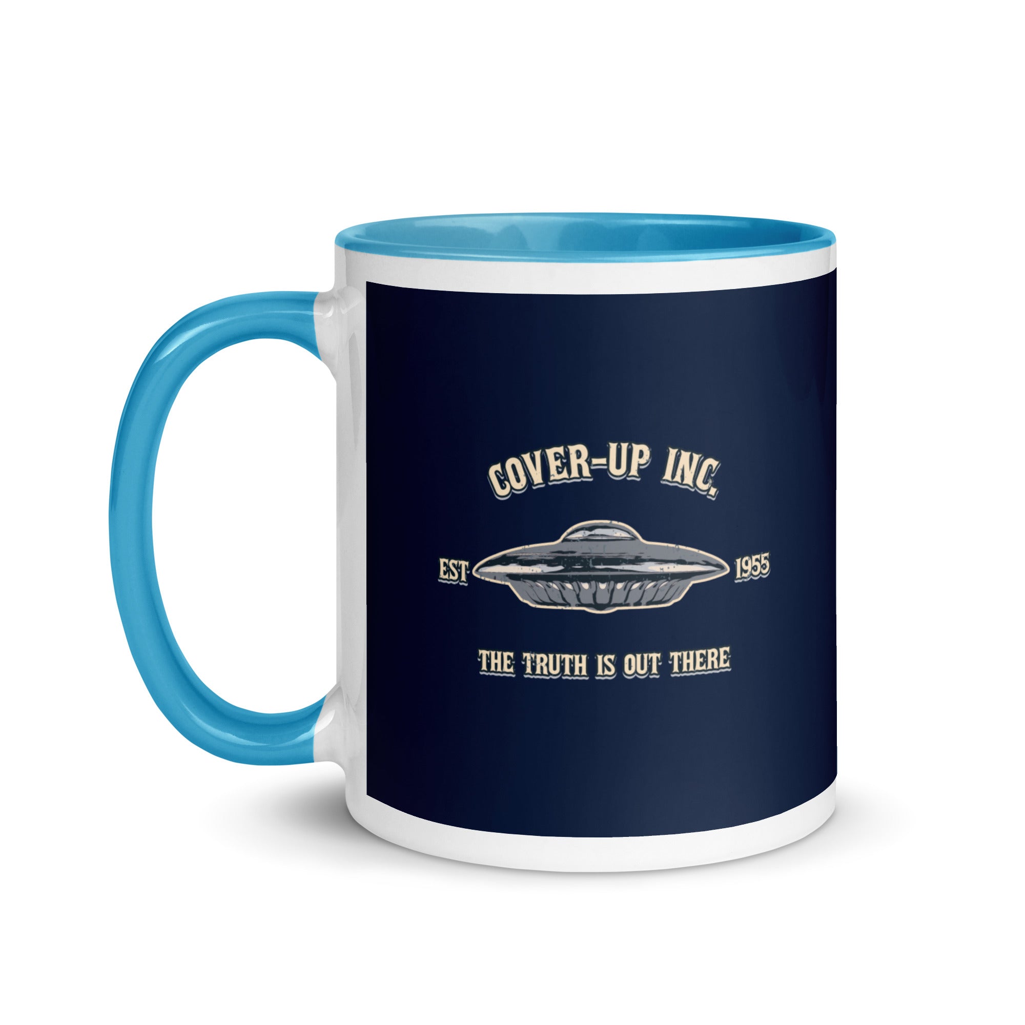 a blue and white coffee mug with the words cover - up inc on it