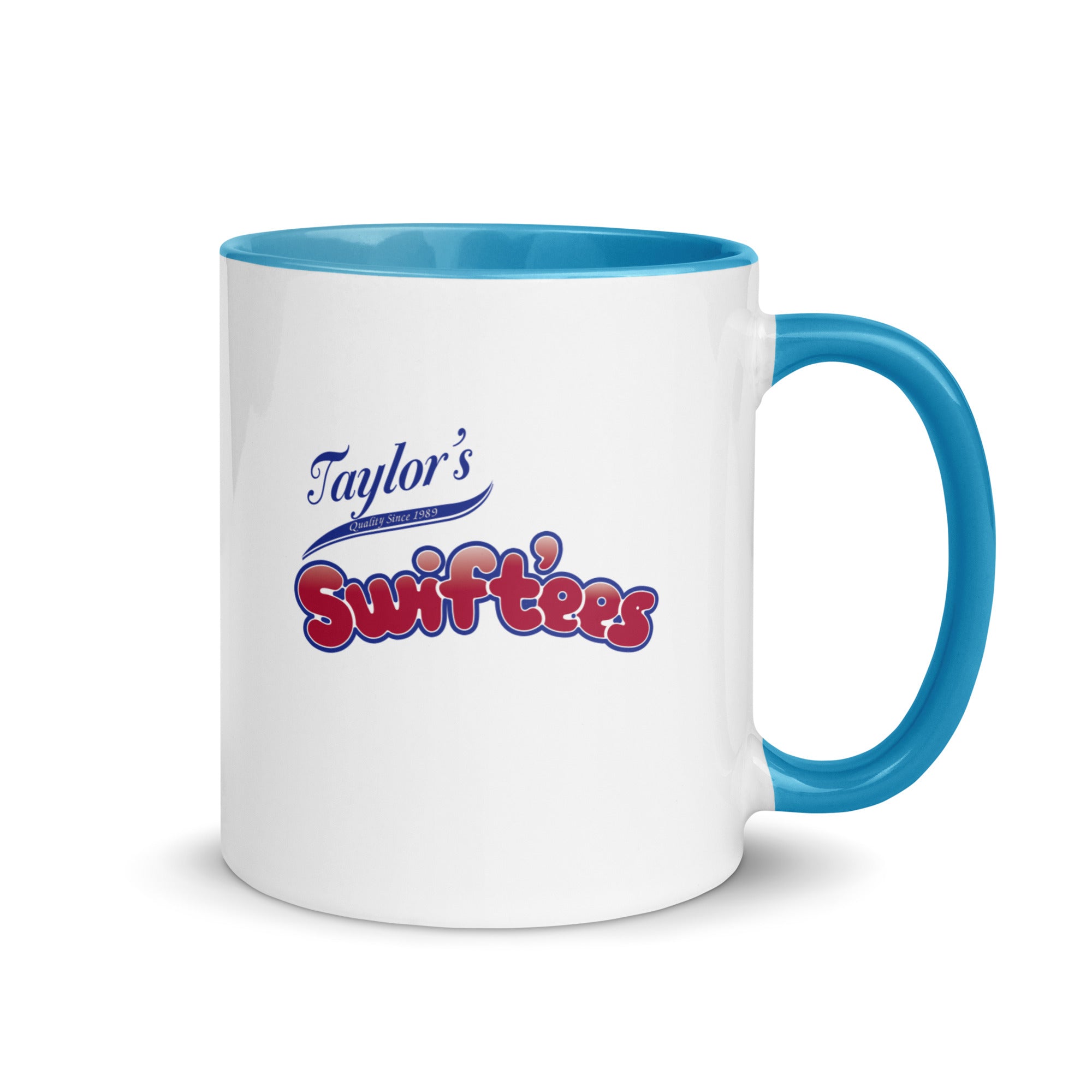 a white and blue coffee mug with taylor's swiftfeasts on it