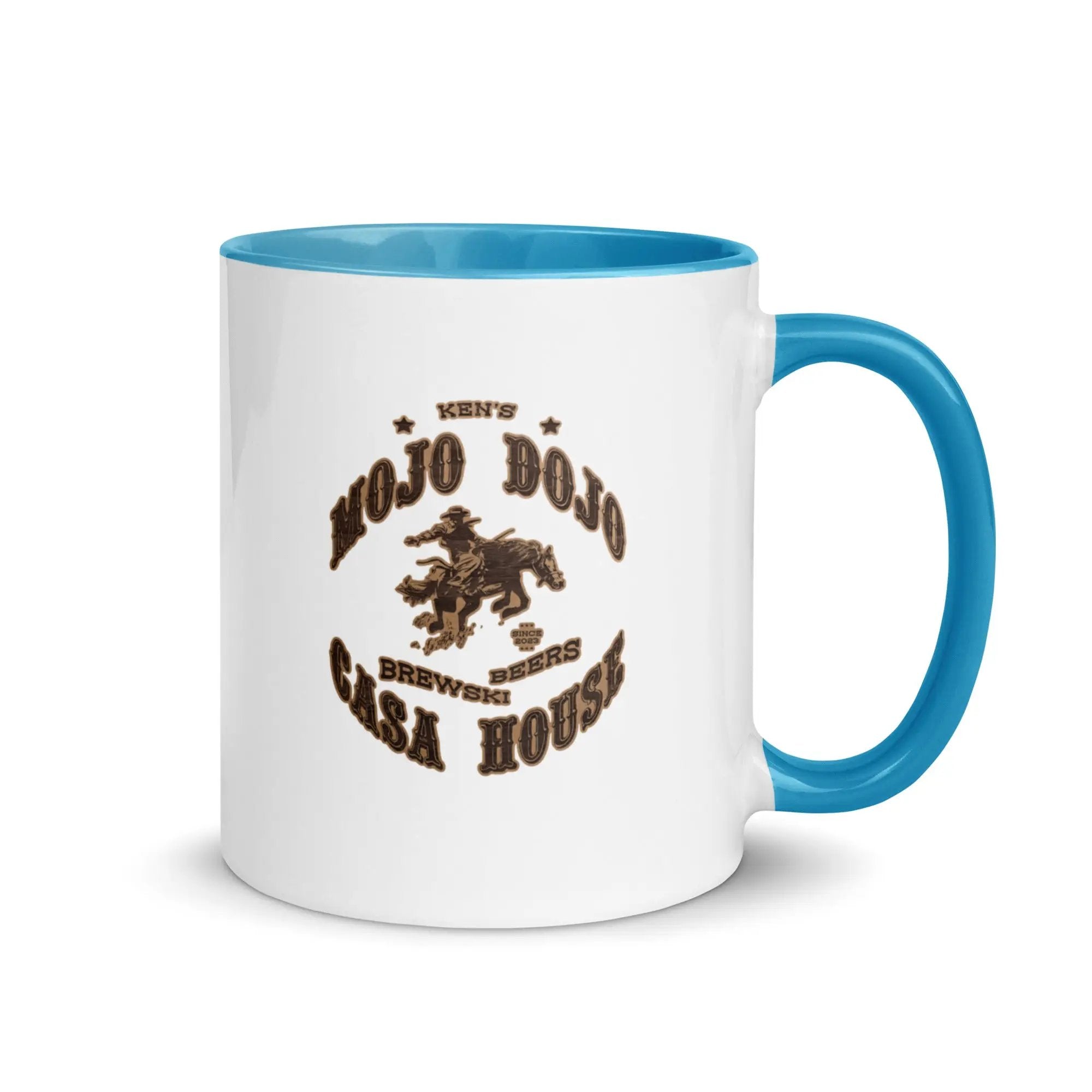 a blue and white coffee mug with a horse on it