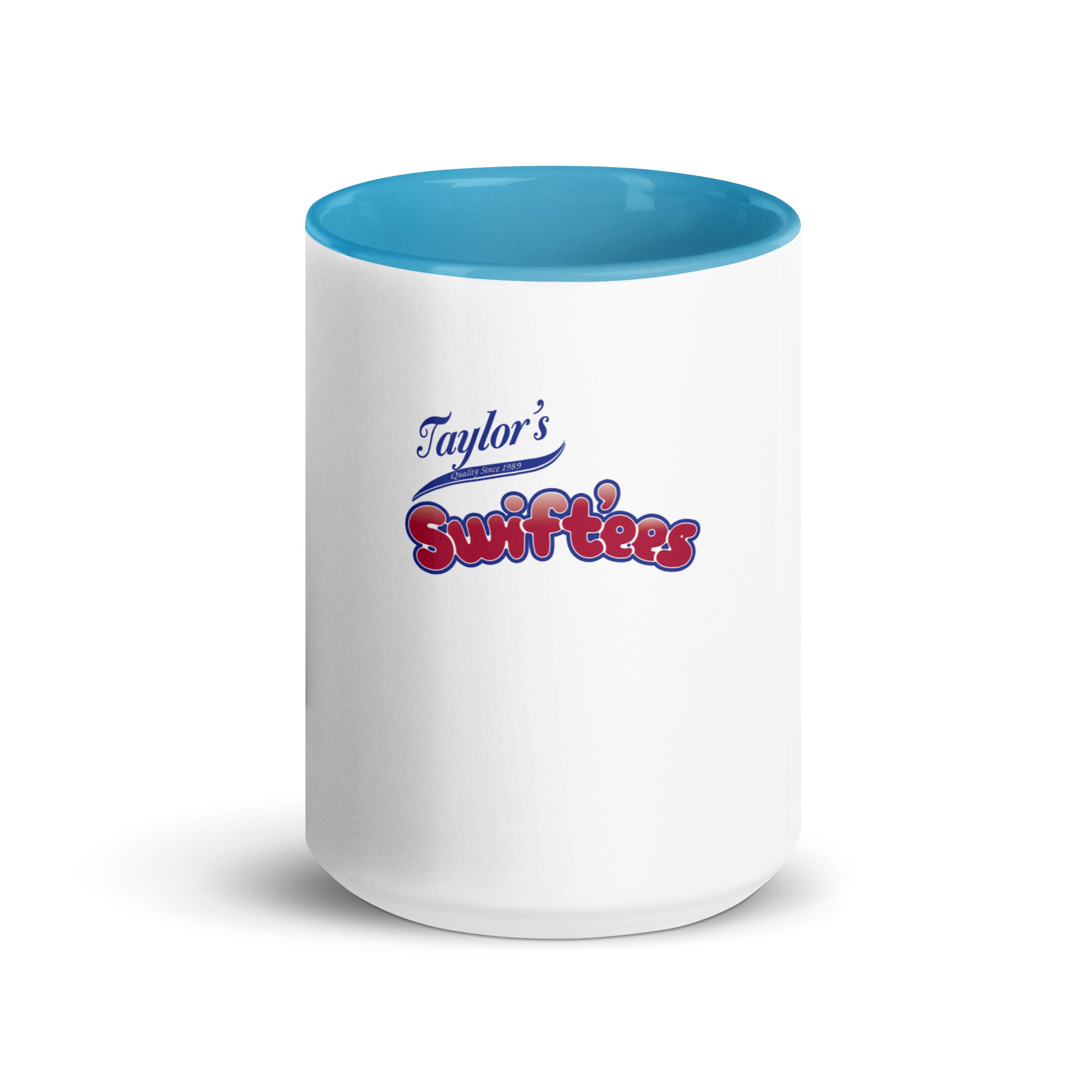 a white and blue coffee mug with a blue rim