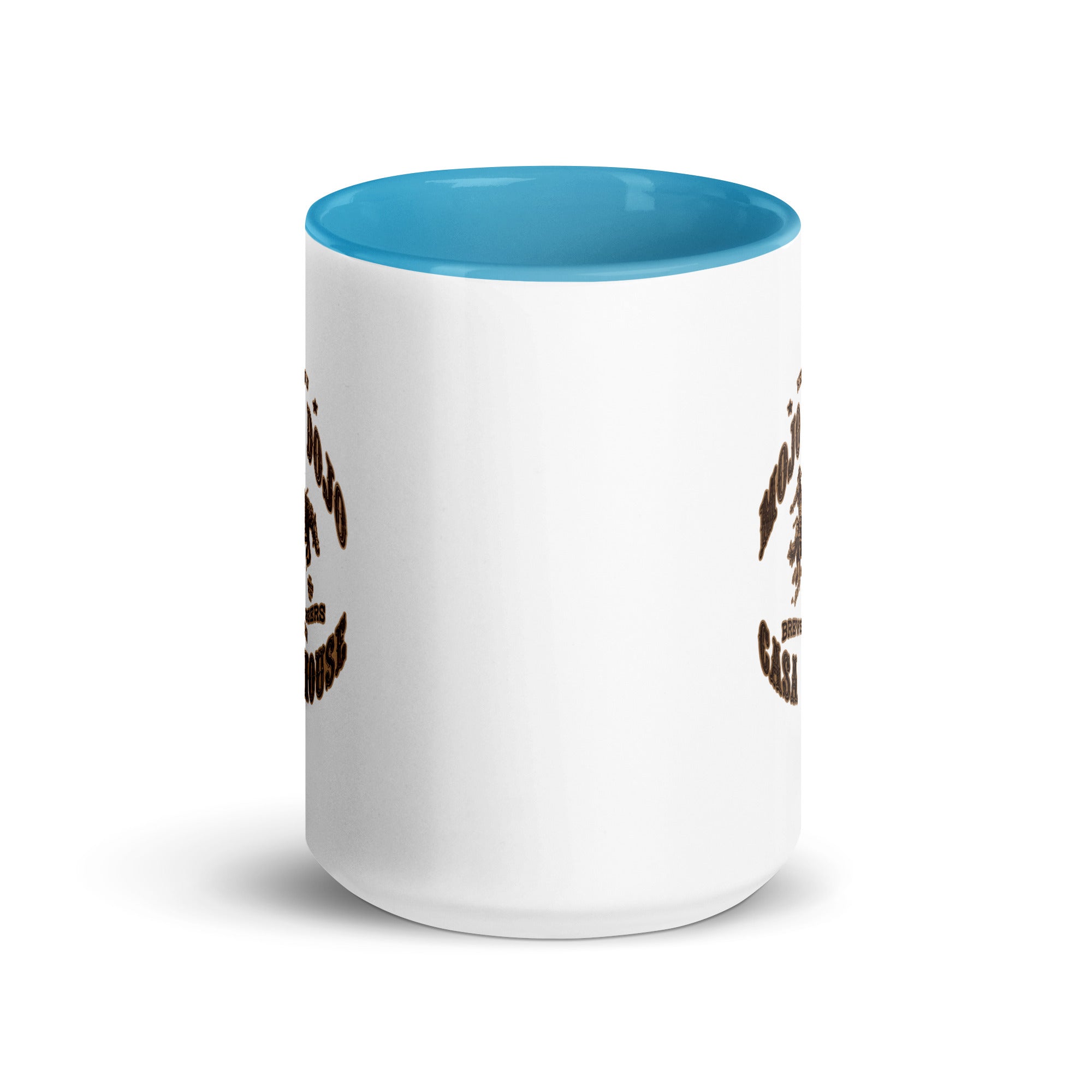 a white and blue coffee mug with an owl on it