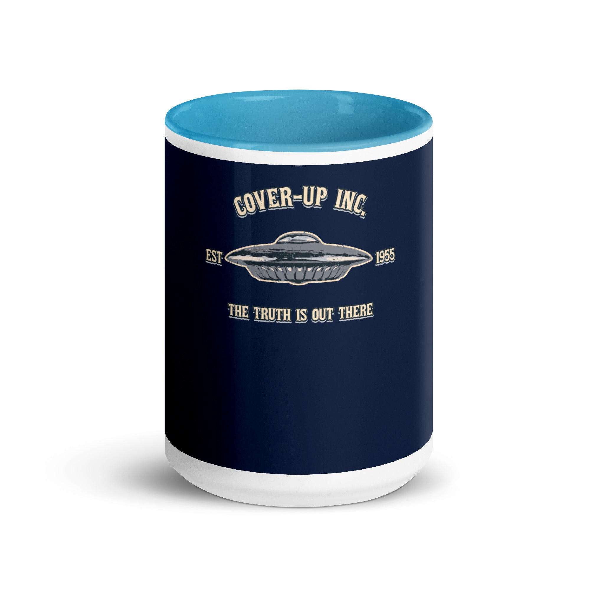 a blue and white coffee mug with the words cover - up inc on it
