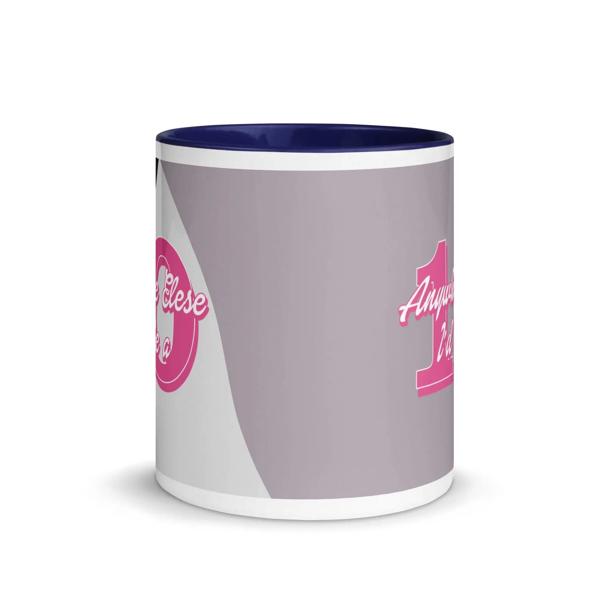 a pink and white coffee mug with the letter i on it