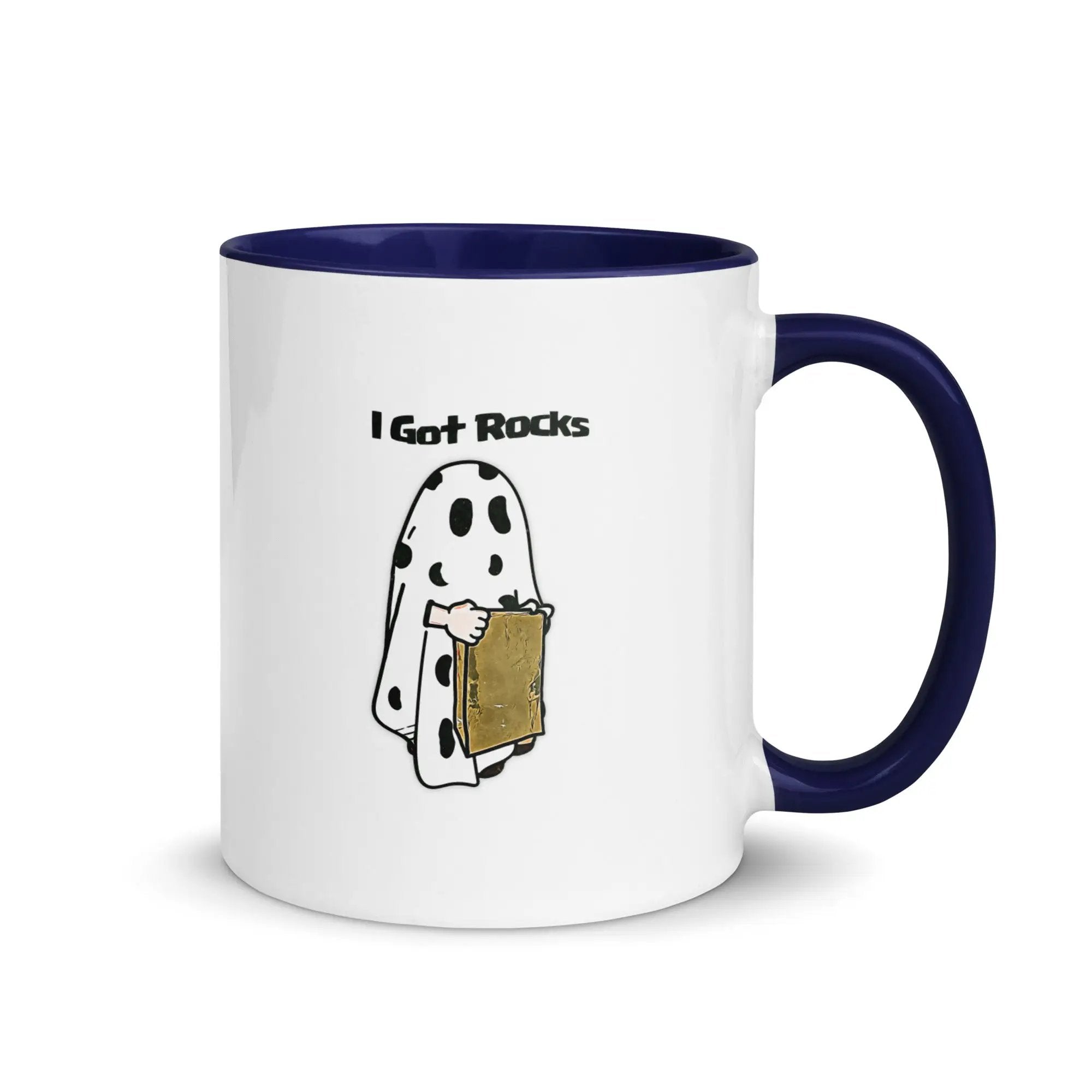 a white and blue coffee mug with a cartoon of a ghost holding a box
