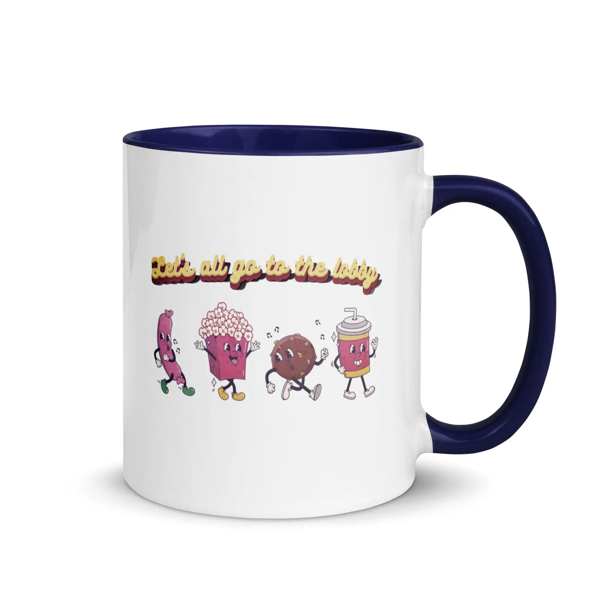 a white and blue coffee mug with cartoon characters on it