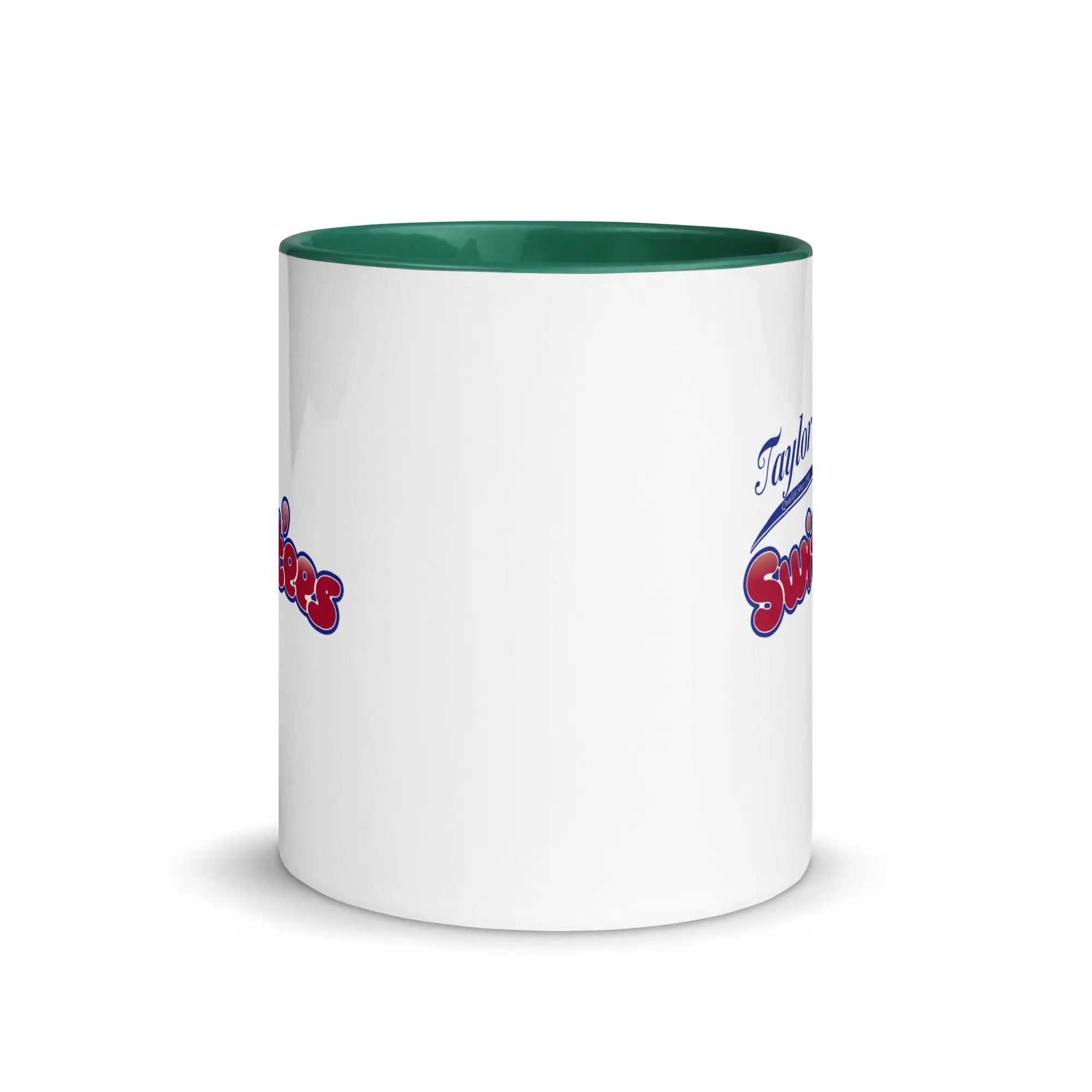 a white coffee mug with a green rim
