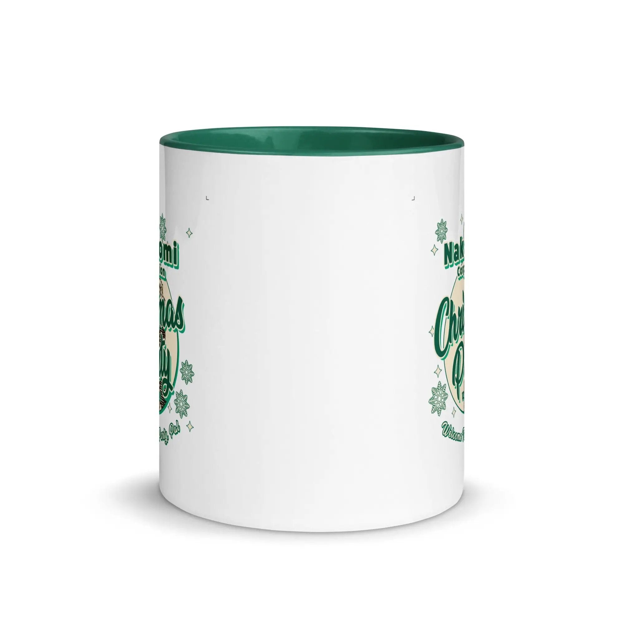 a white and green coffee mug with shamrocks on it