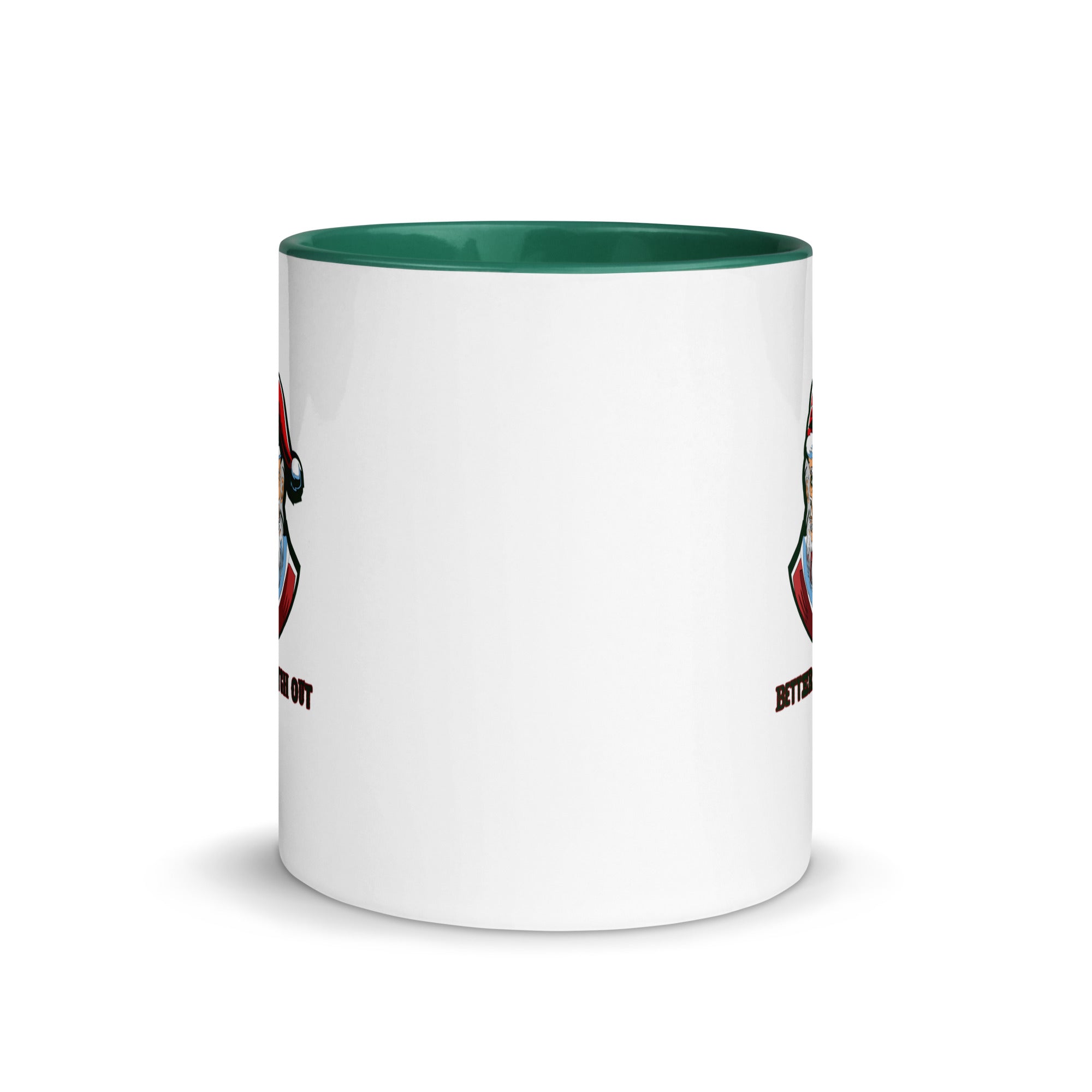 a white coffee mug with a green rim