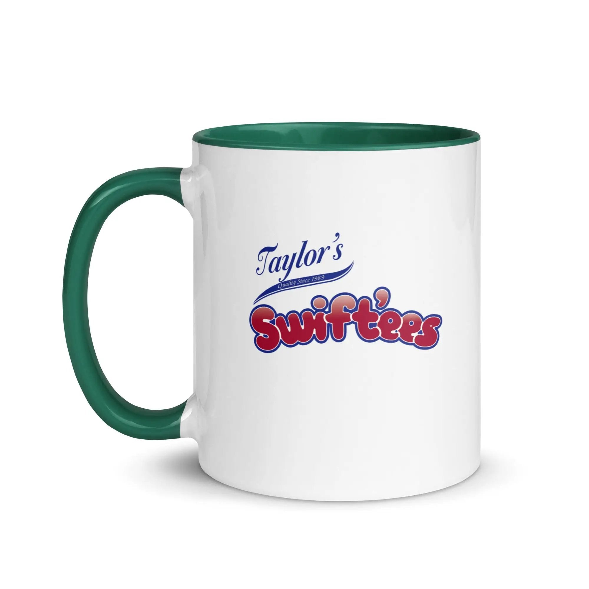 a white and green coffee mug with the words taylor's softies on it