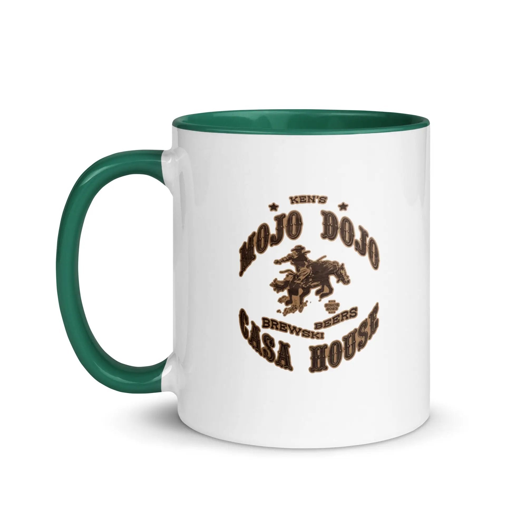 a white and green coffee mug with the words old crow saloon on it