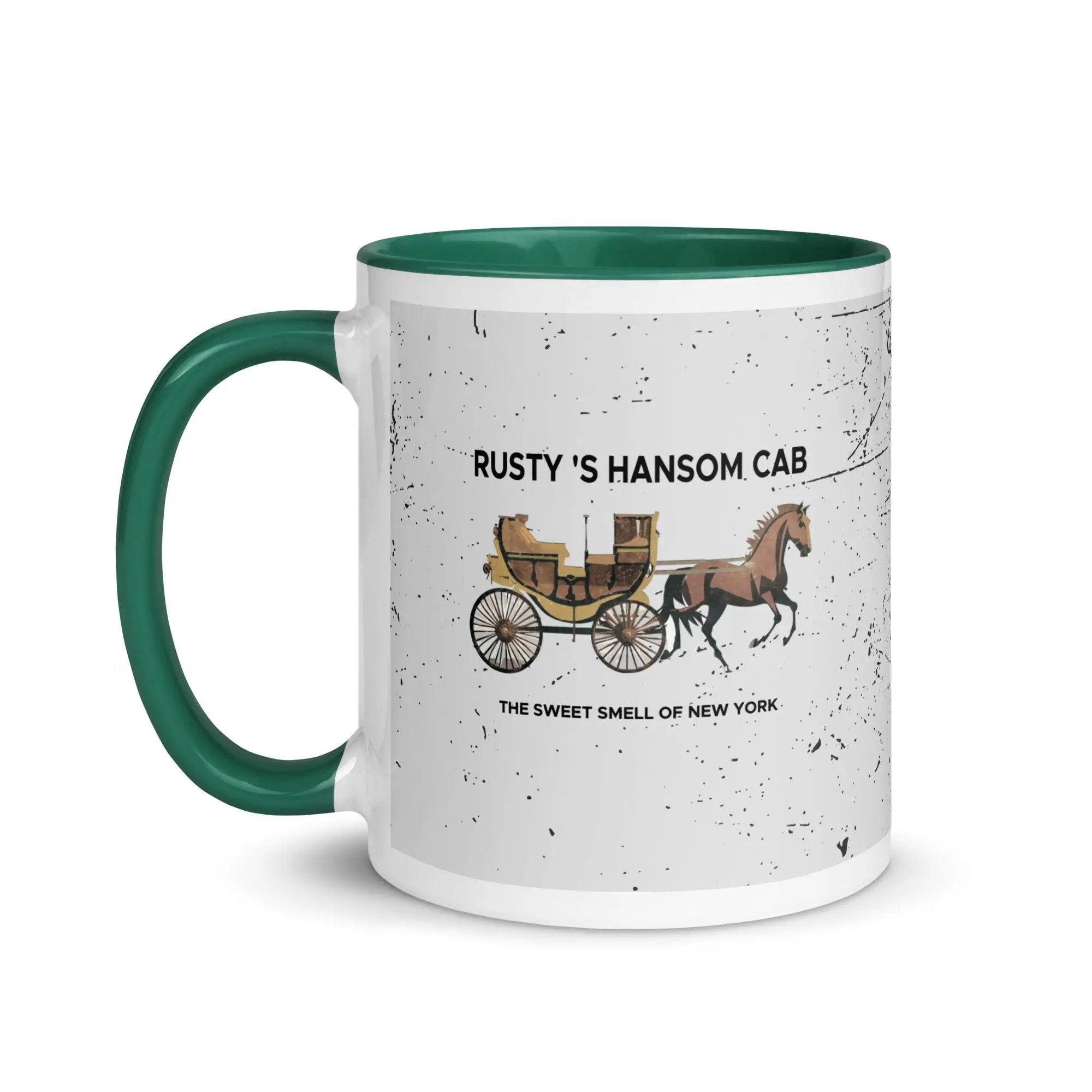 a green and white coffee mug with a horse drawn carriage