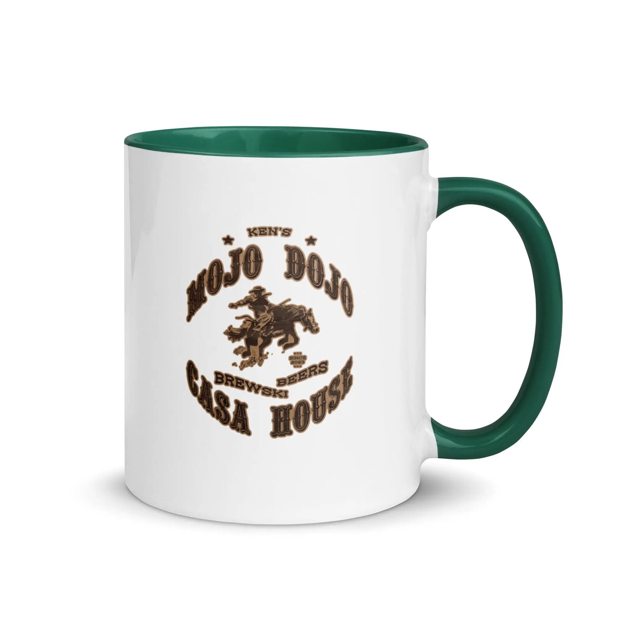 a white and green coffee mug with a horse on it