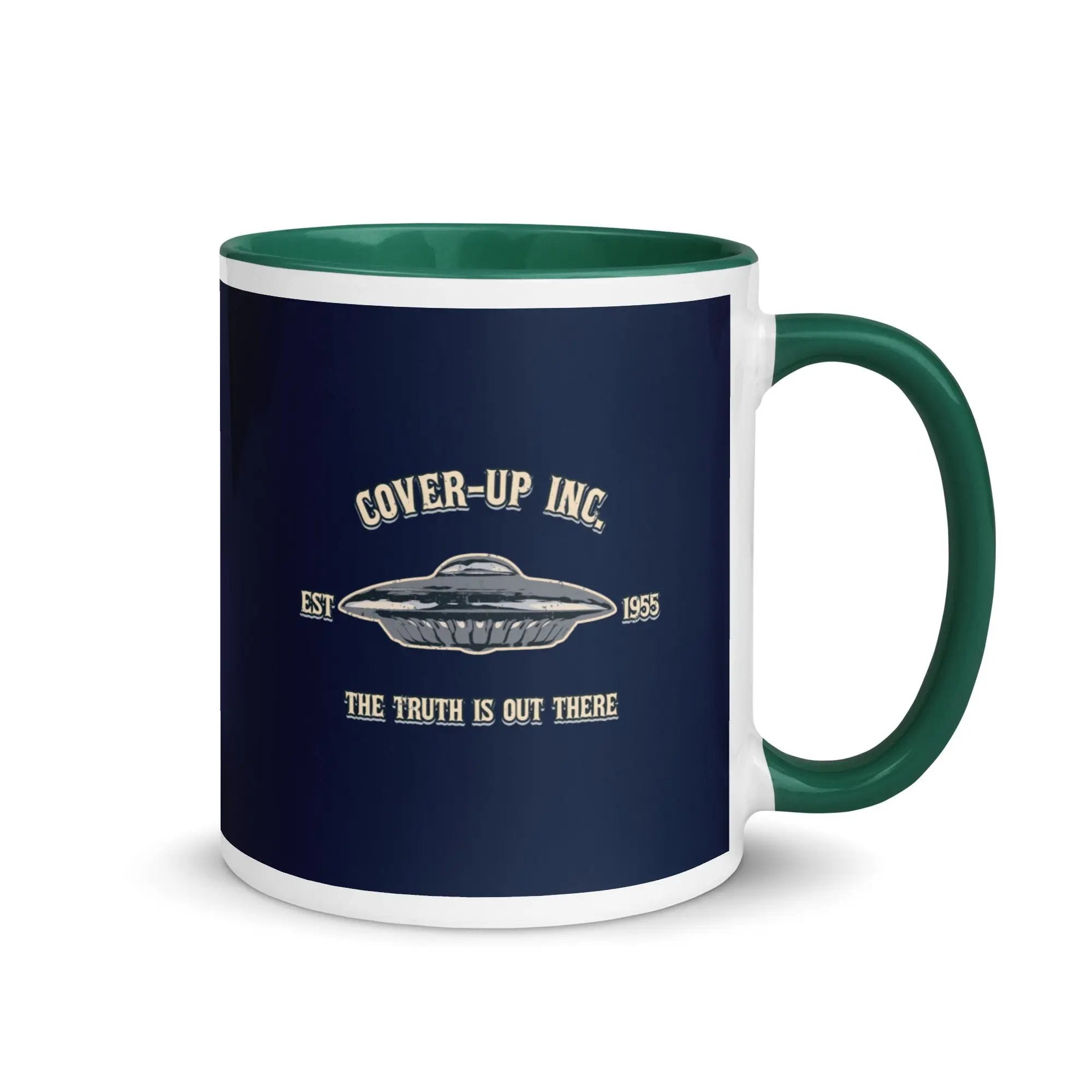 a green and white coffee mug with the words cover - up inc on it