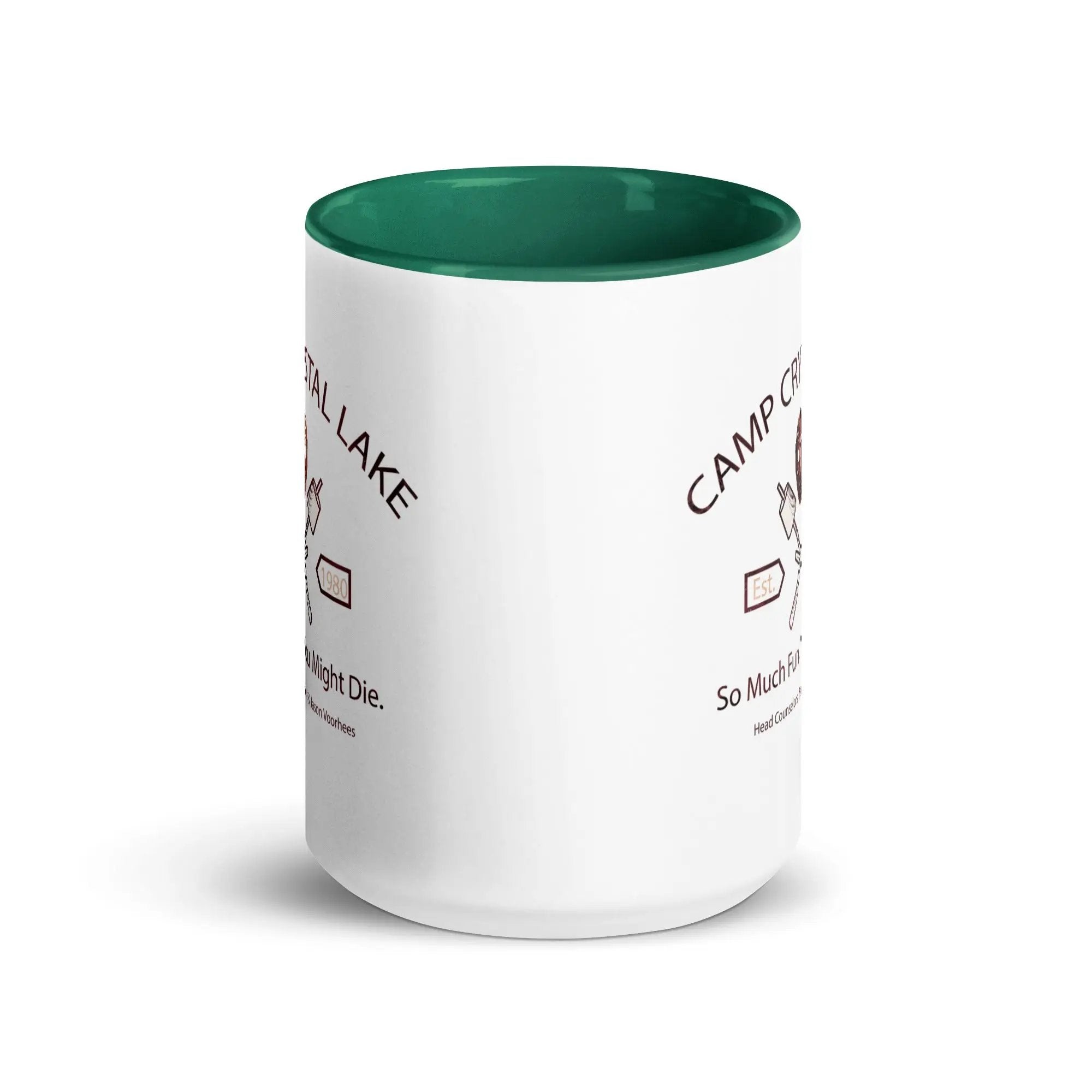 a white coffee mug with a green rim