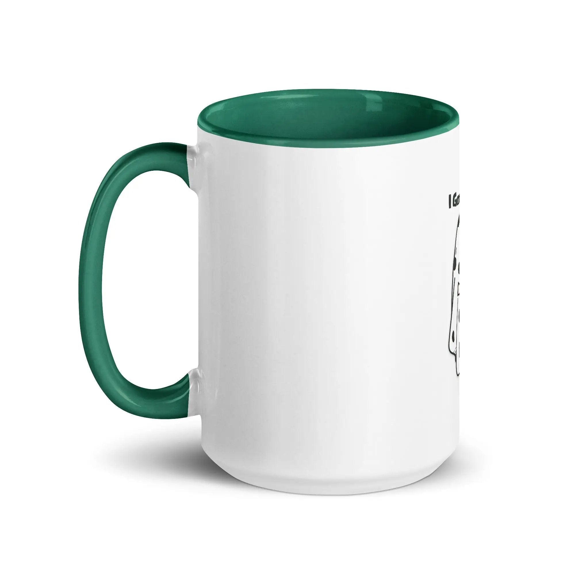 a white and green coffee mug with a green handle