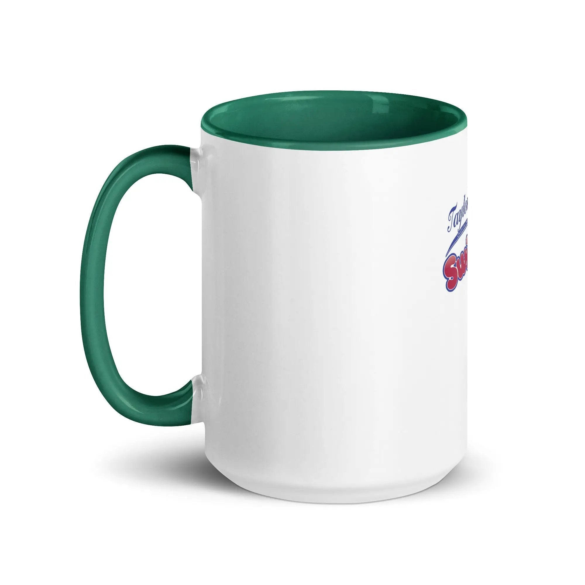 a white and green coffee mug with a green rim