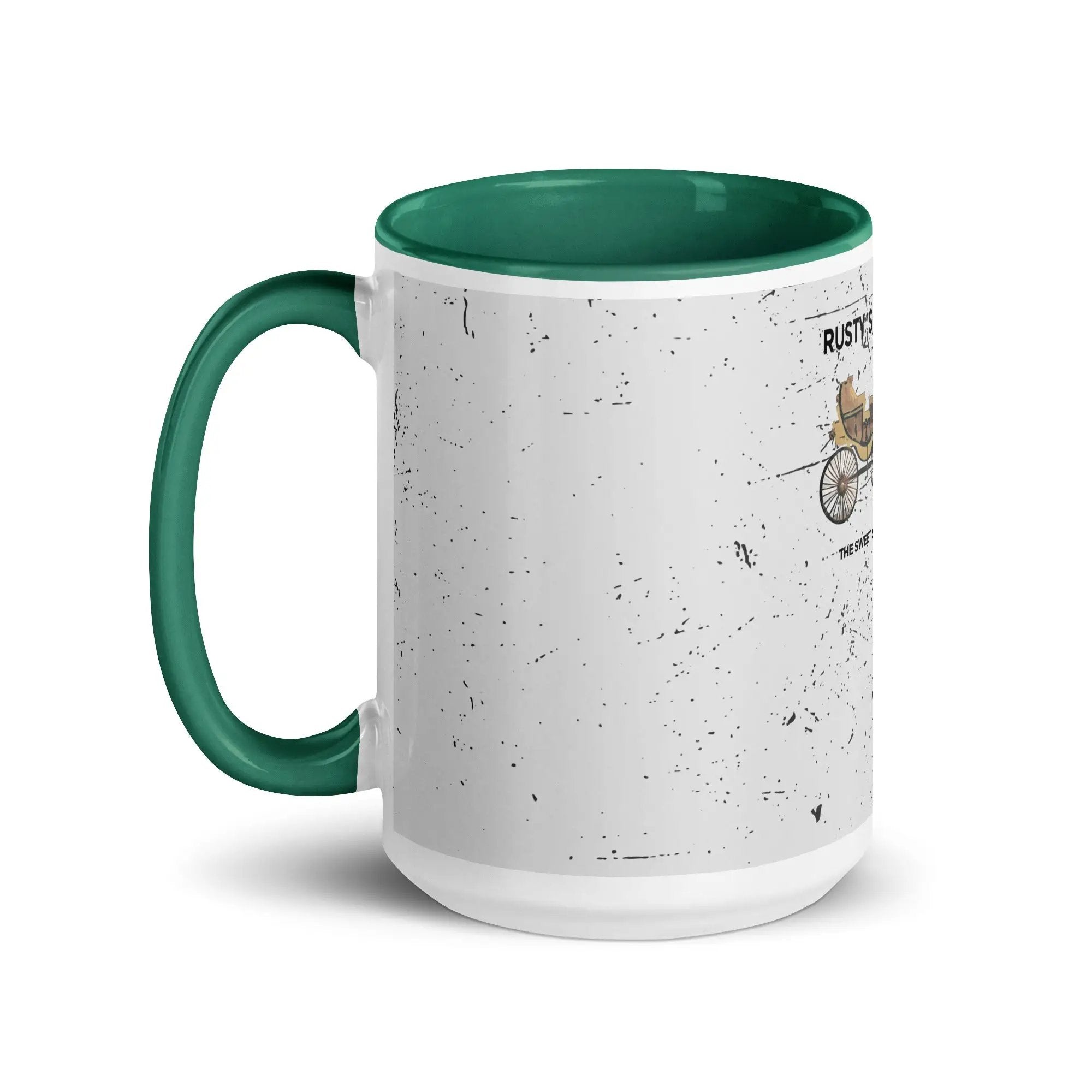 a green and white coffee mug with a picture of a cat on it