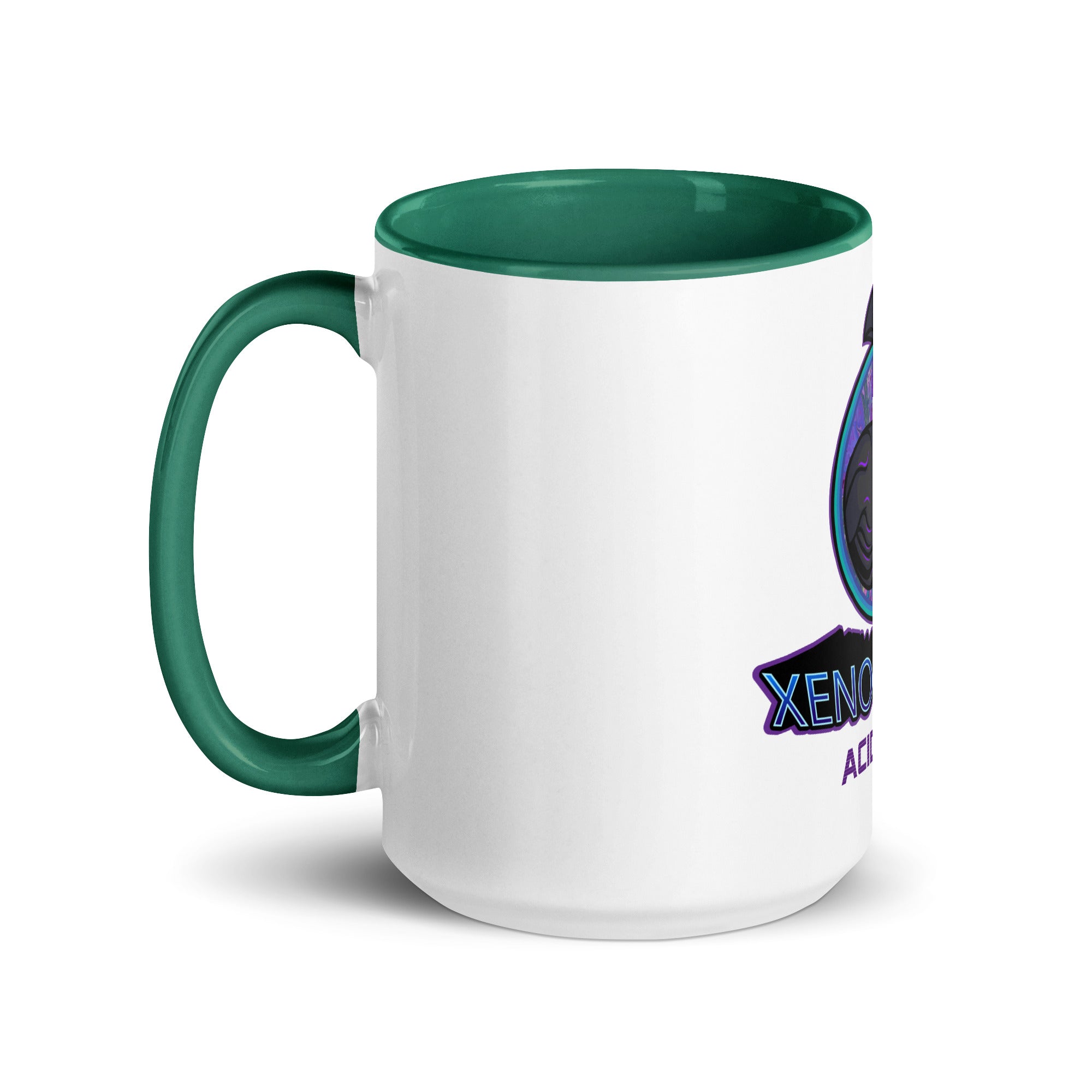 a white and green coffee mug with a green handle