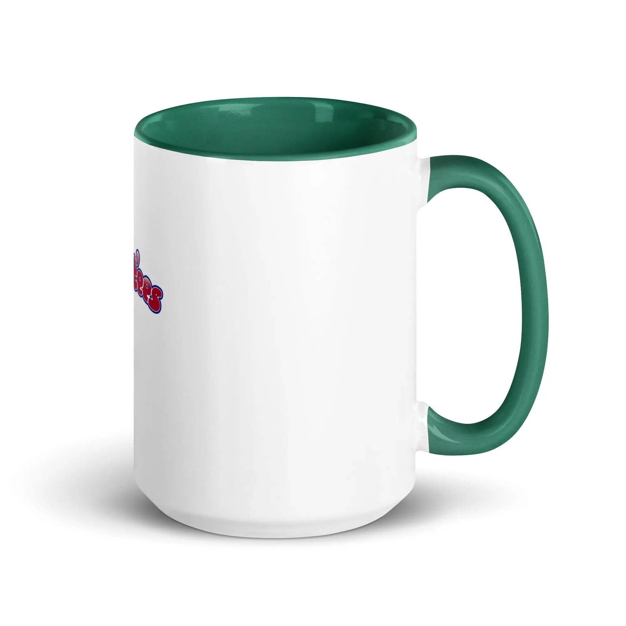 a white and green coffee mug with a green handle