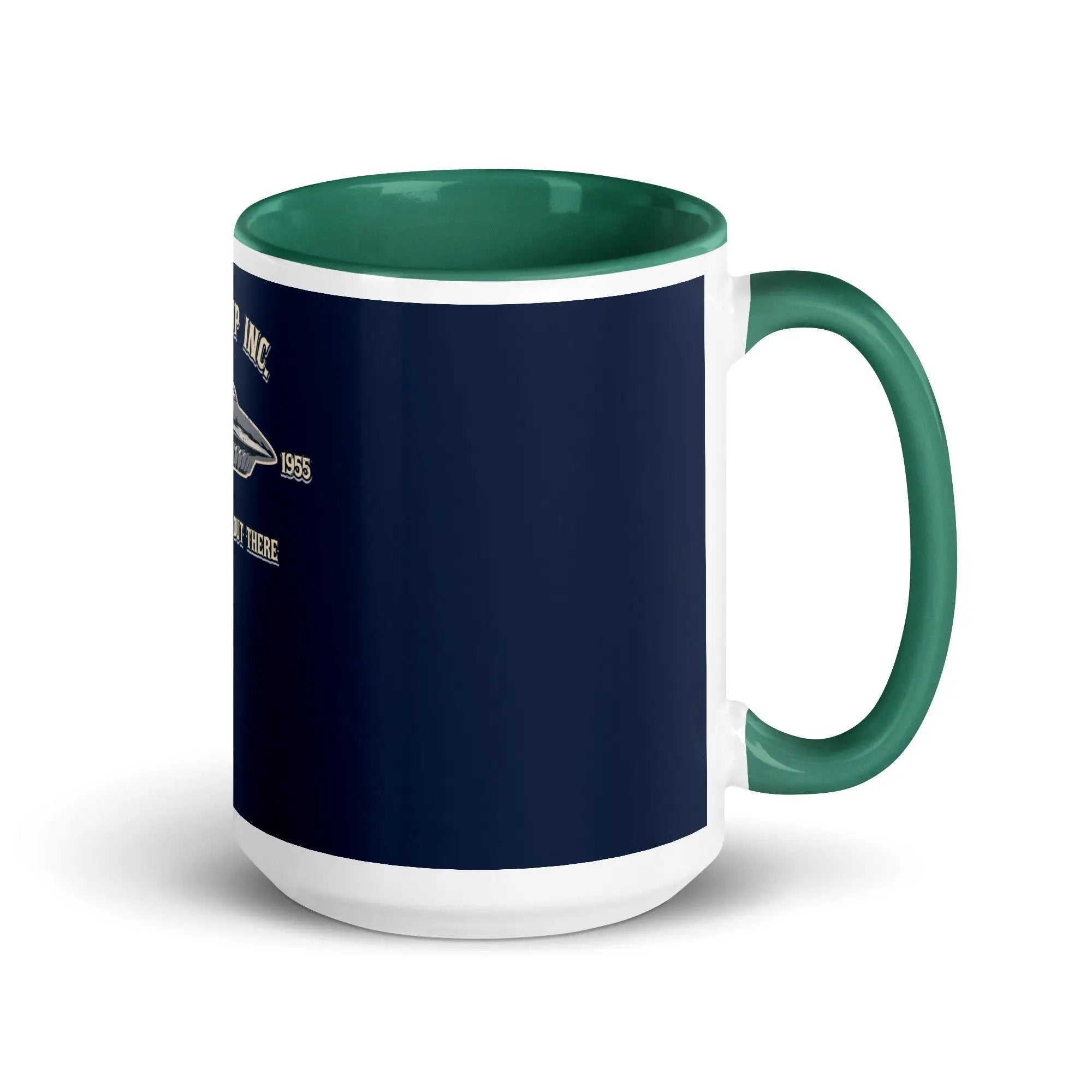 a blue and white coffee mug with a green handle