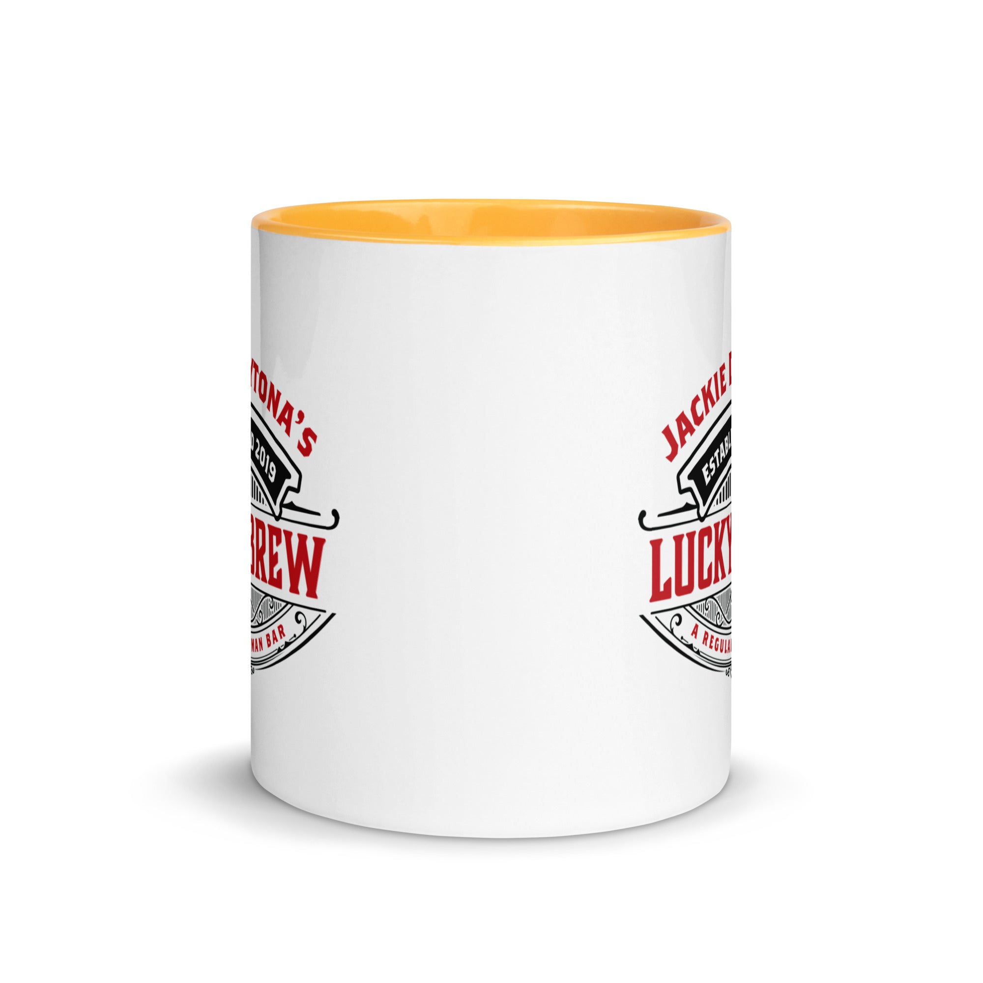 a white coffee mug with a yellow rim