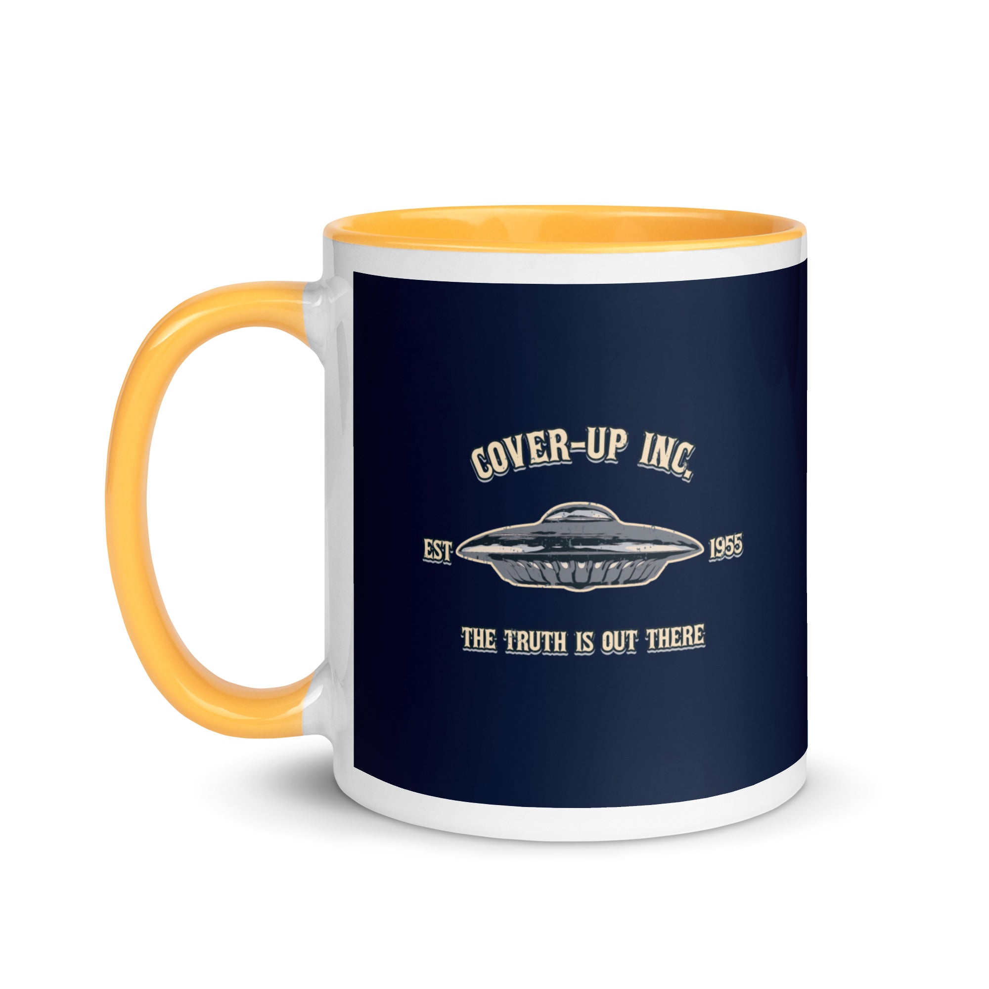 a yellow and white coffee mug with the words cover - up inc on it