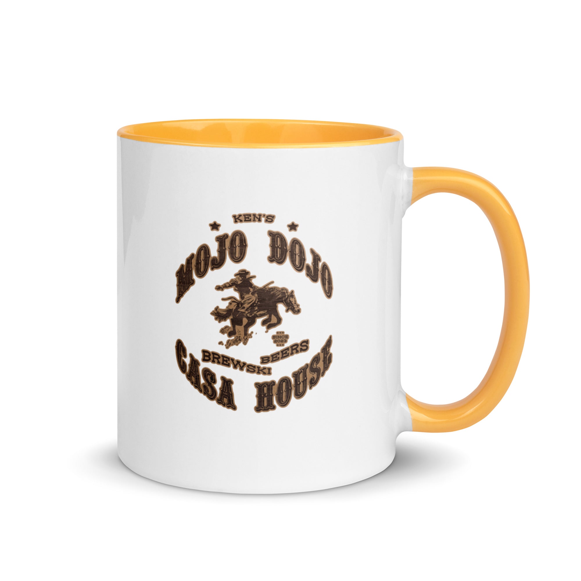 a white and yellow coffee mug with a horse on it