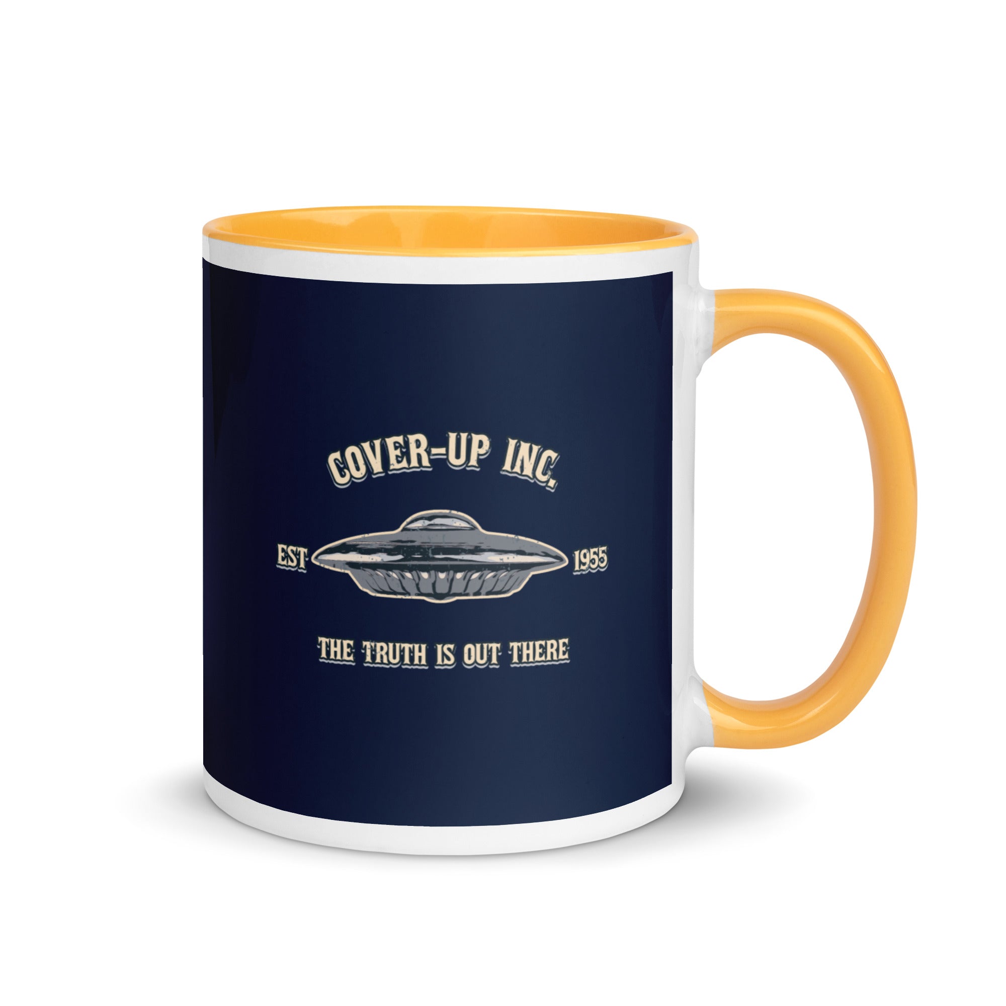 a yellow and white coffee mug with the words cover - up inc on it