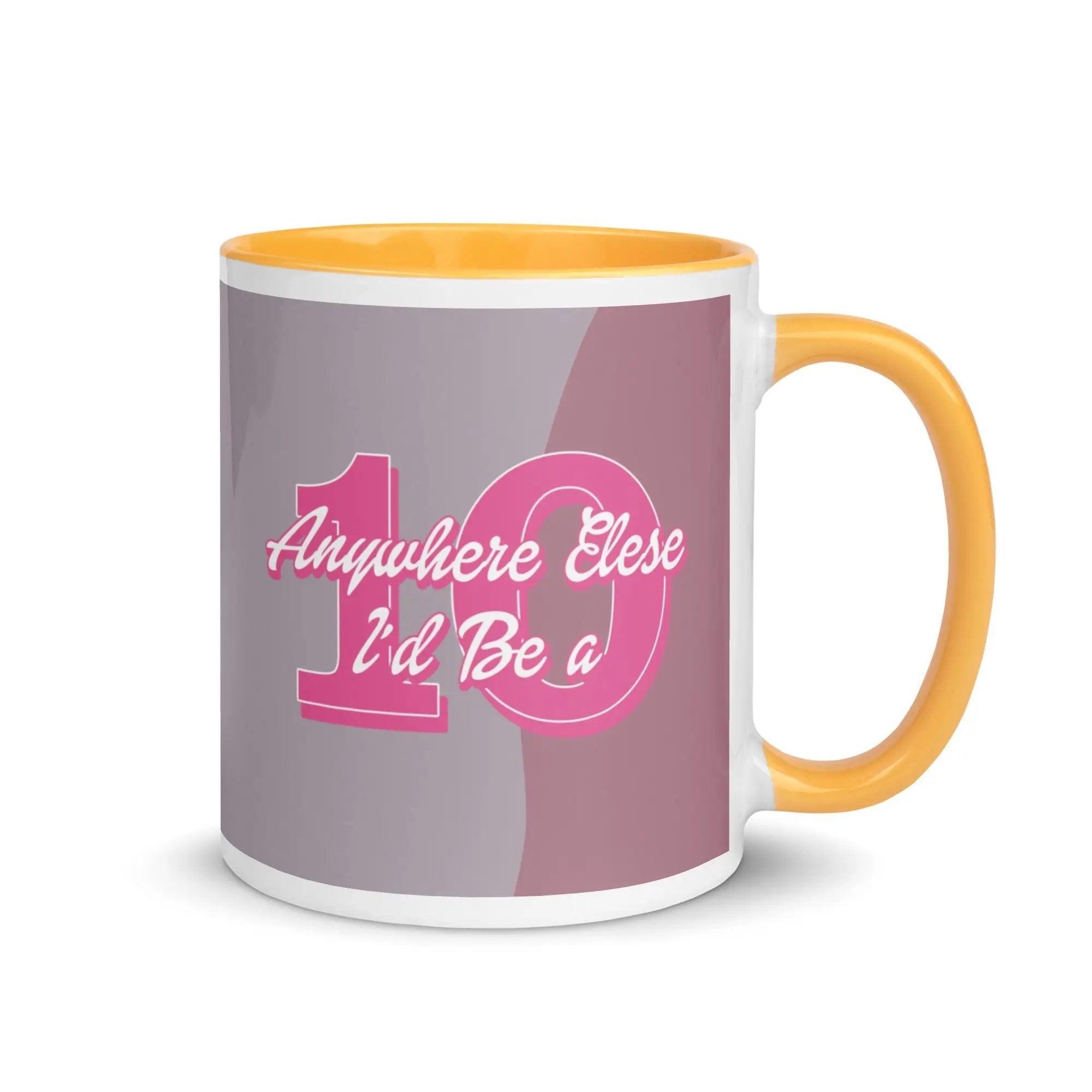 an orange and white coffee mug with a pink and grey background