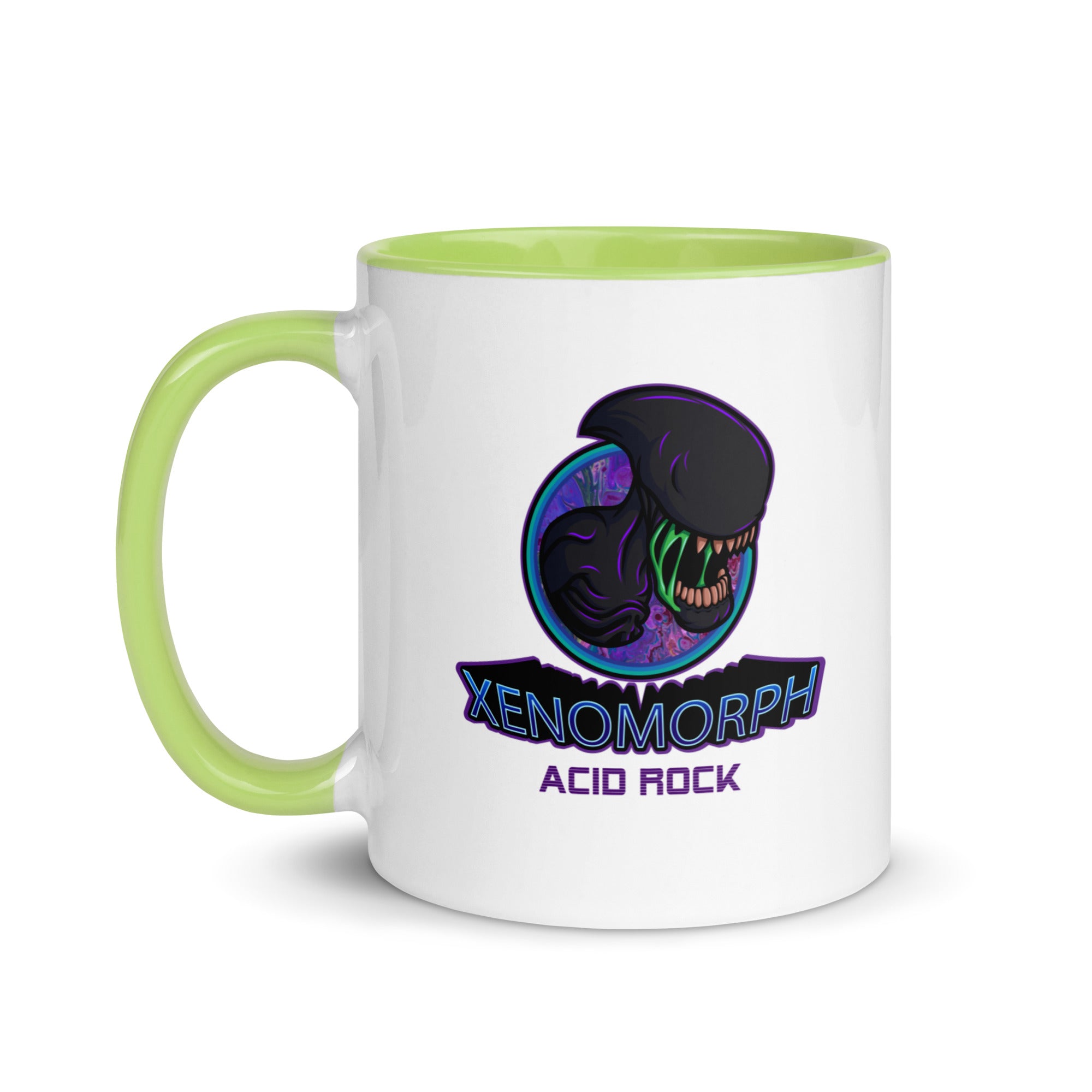a green and white coffee mug with an image of a dinosaur