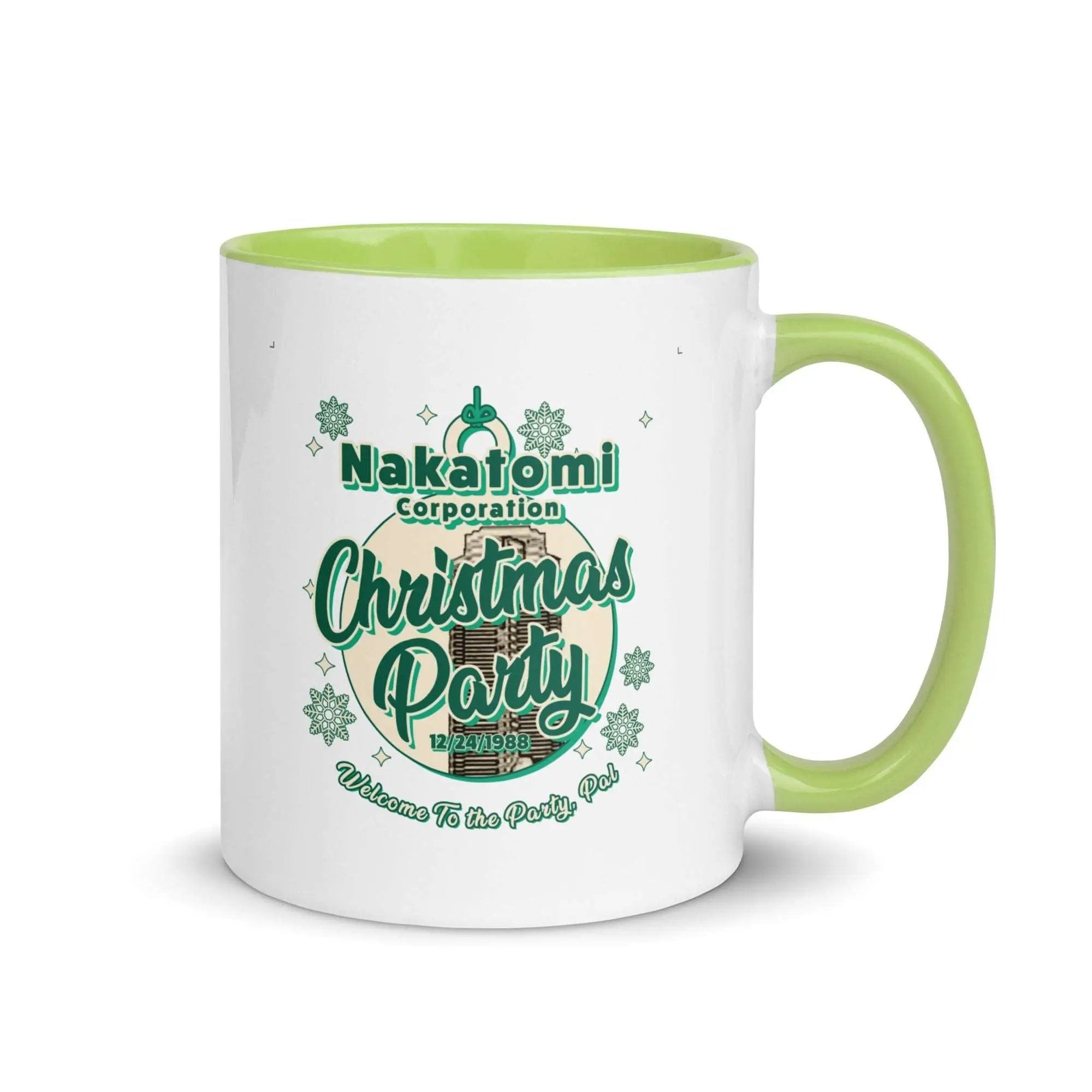 a white and green coffee mug with a christmas party design
