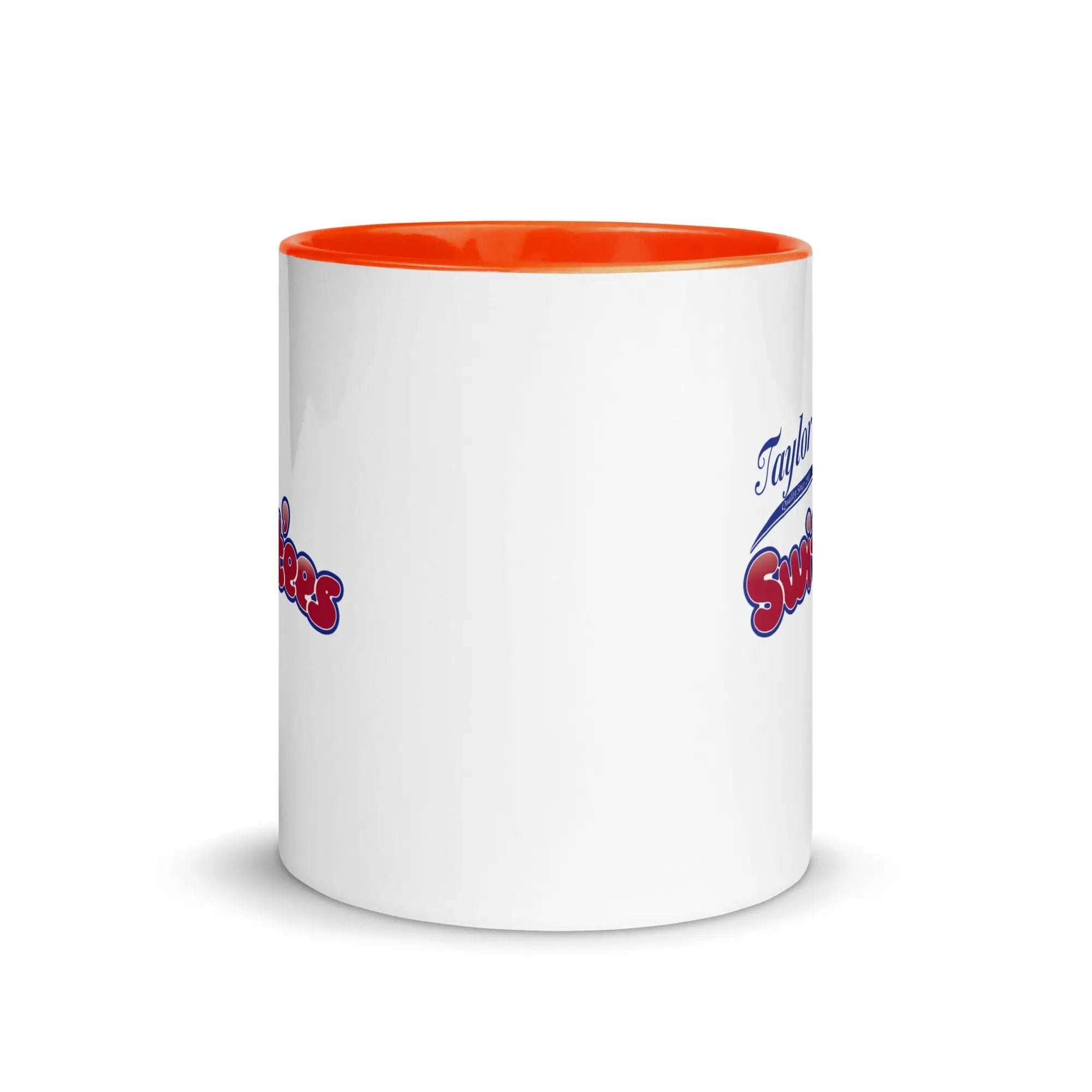 a white and orange coffee mug with an orange rim