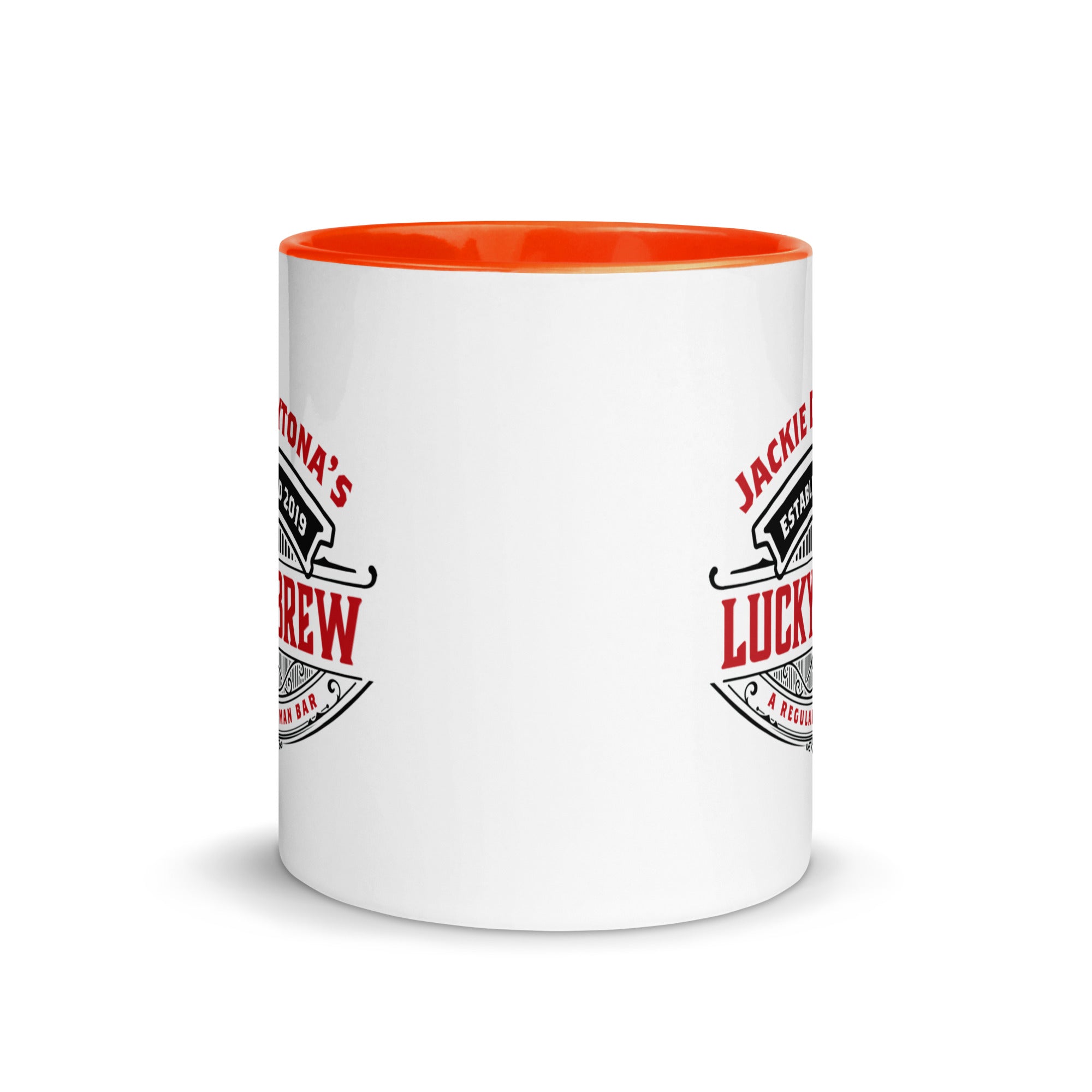 a white and orange coffee mug on a white background
